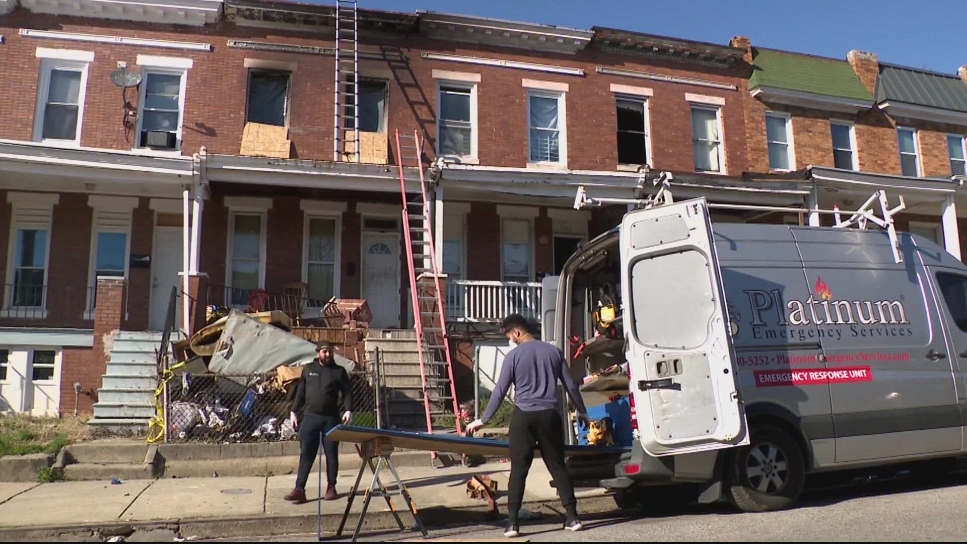 Three children died and two adults were injured Saturday morning in a fire at a home in Baltimore, authorities said.
