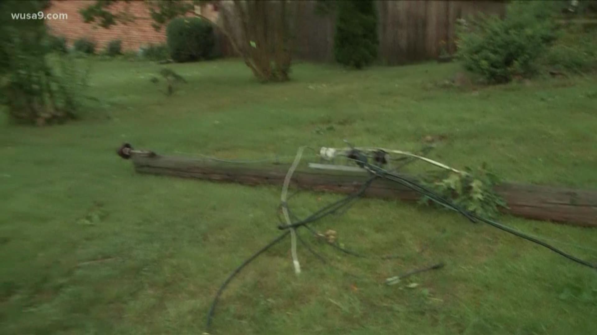 A power line pole in the a neighborhood in Montgomery County, Maryland after heavy storms.