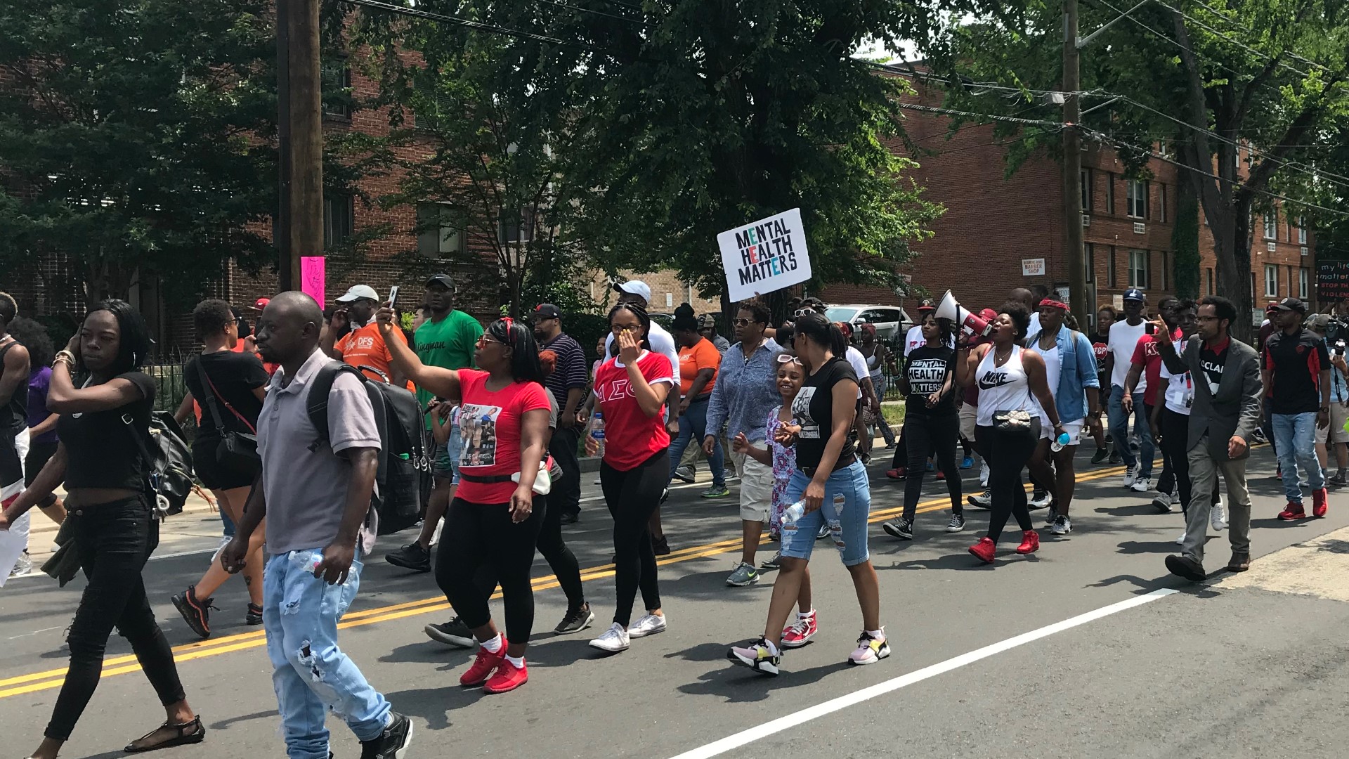 As part of the fourth annual "Peace Rally,"' dozens of Southeast residents marched down Benning Road to push for an end to gun violence in their community.