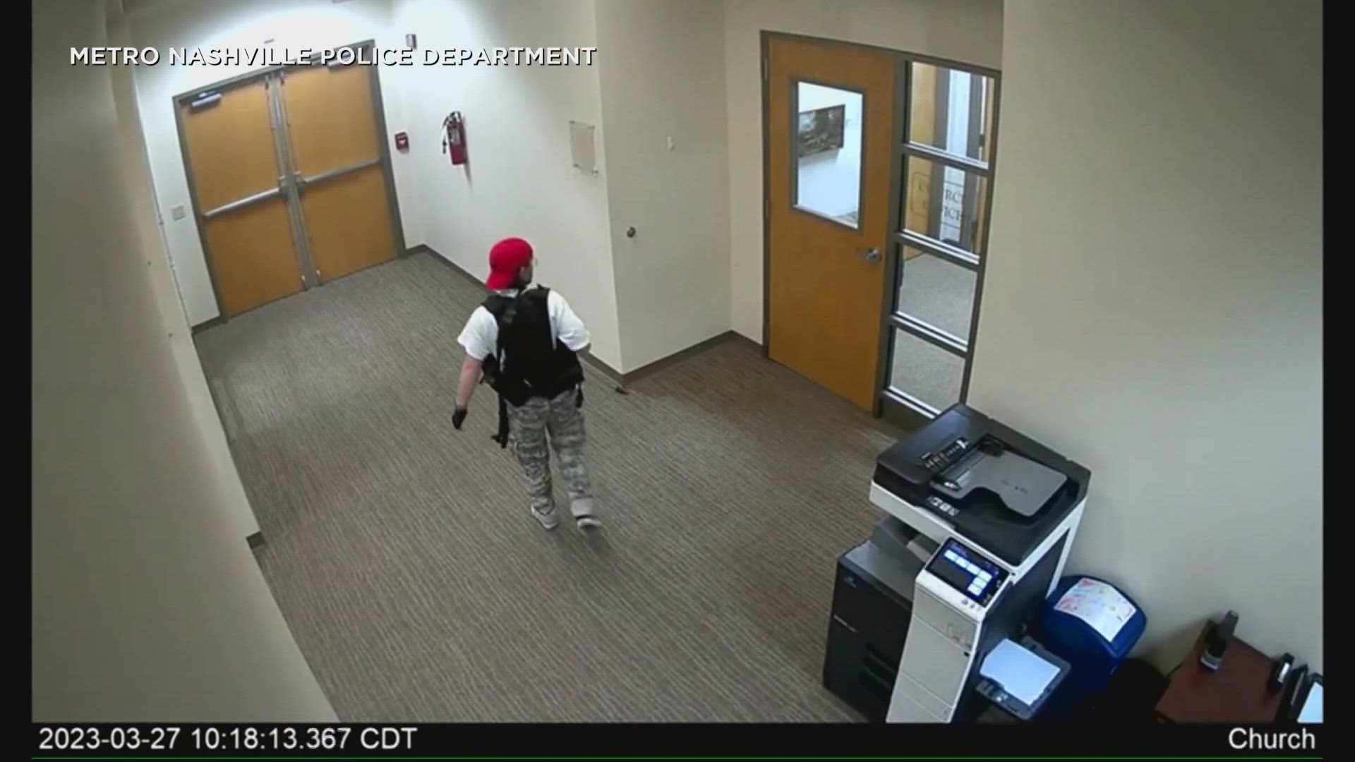 Police released about two minutes of edited surveillance video that included a view of glass doors to the school being shot out and the shooter ducking through.