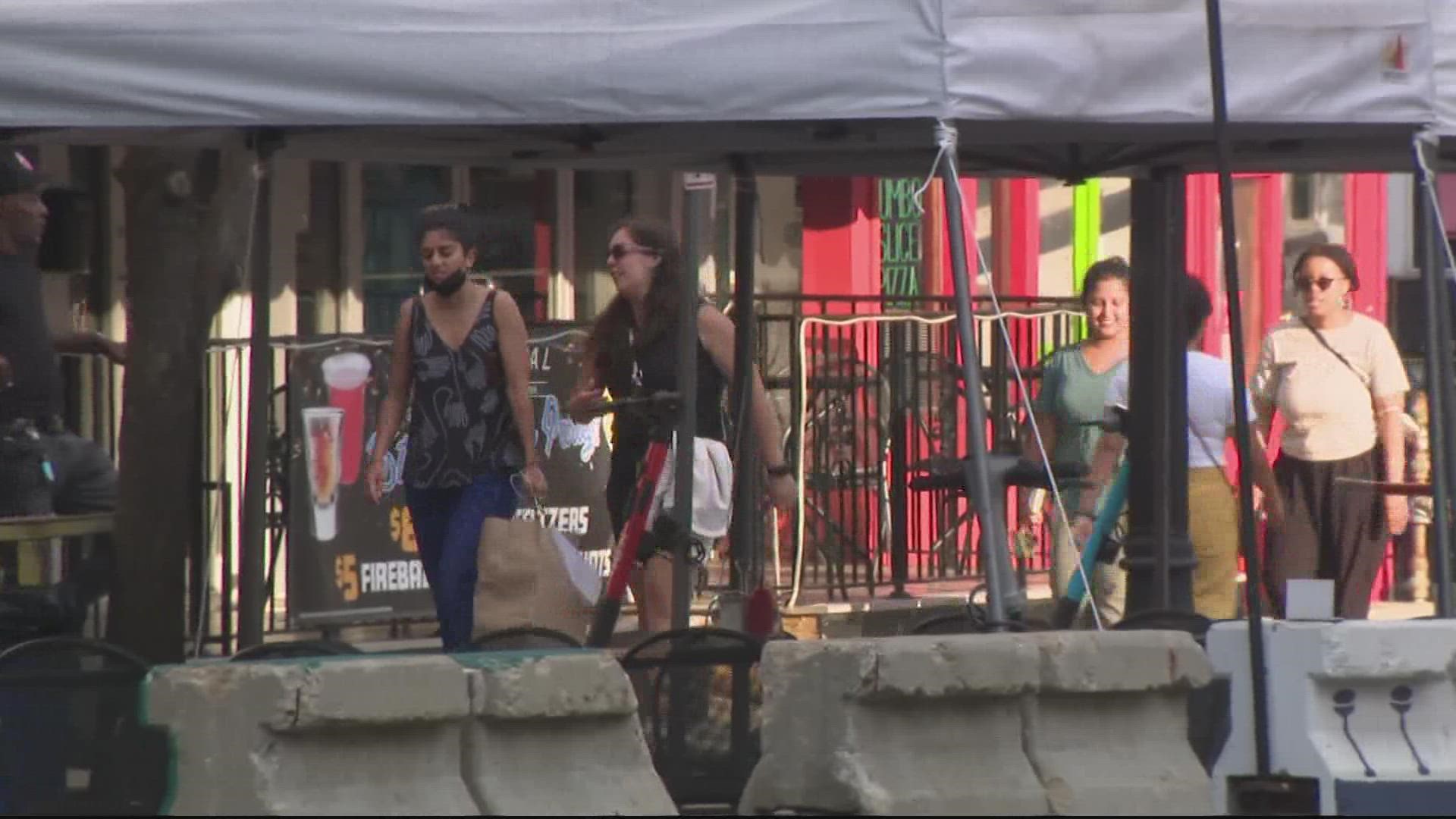 Adams Morgan is known for its restaurants, live entertainment, and shopping. Since the pandemic, restaurant "streeteries" have filled area parking lanes.