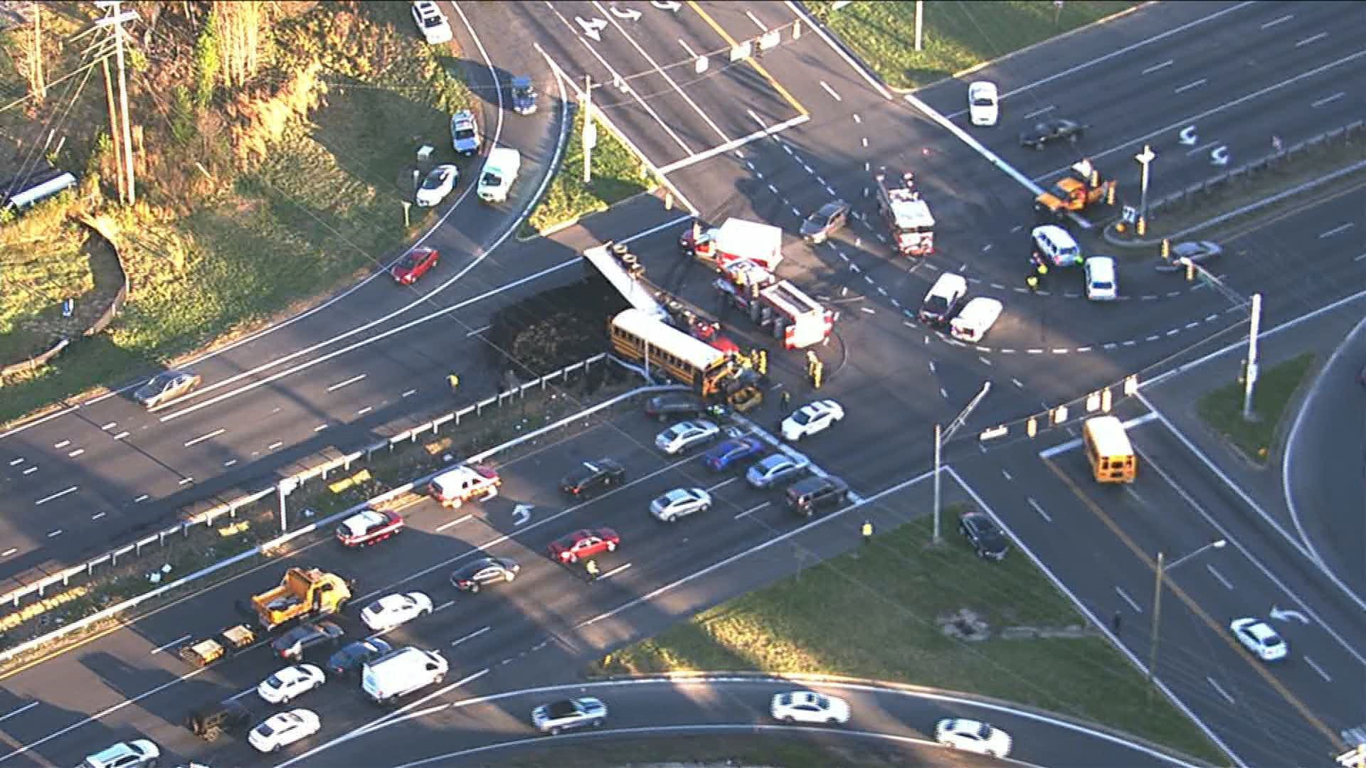 1 dead, 6 injured including students after crash with school bus and ...