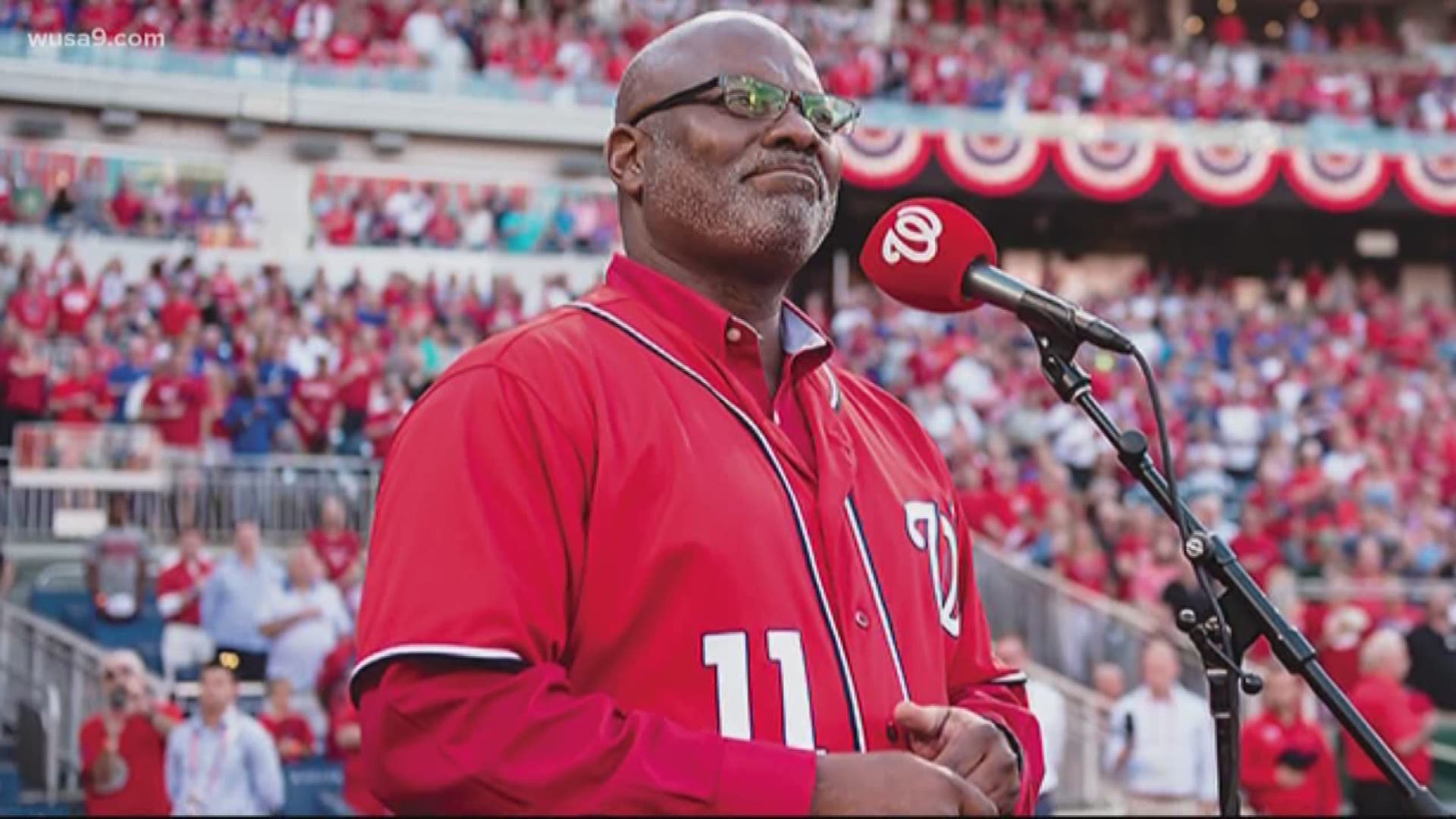 On what should have been the World Series champion's home opener, a fan known as the voice of D.C. sports sang his heart out anyways.