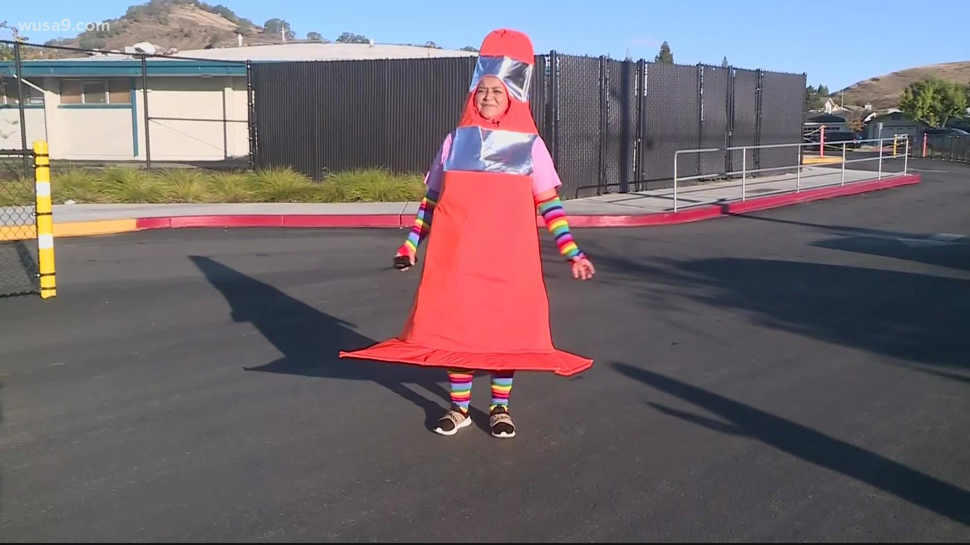 This Assistant Principal wears a traffic cone costume every day in the drop-off and pick-up line at her elementary school.