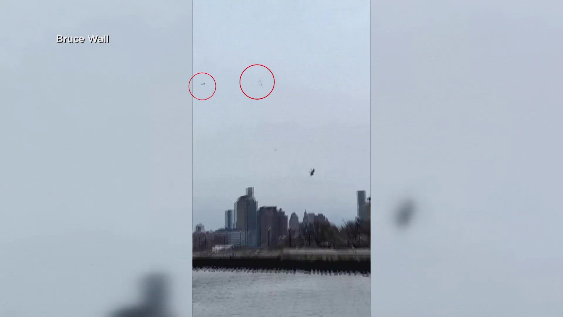 A new video shows the rotors flying off the helicopter before it flips and hits the Hudson River. 