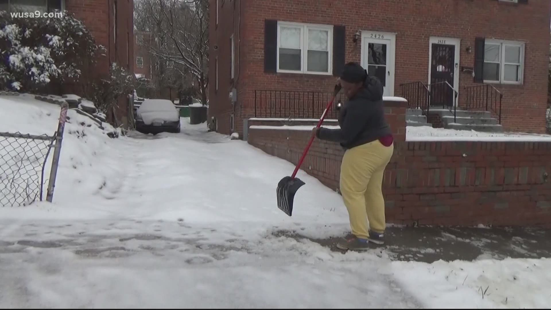 Residents throughout DC work to remove the snow and ice before the second round of winter weather.