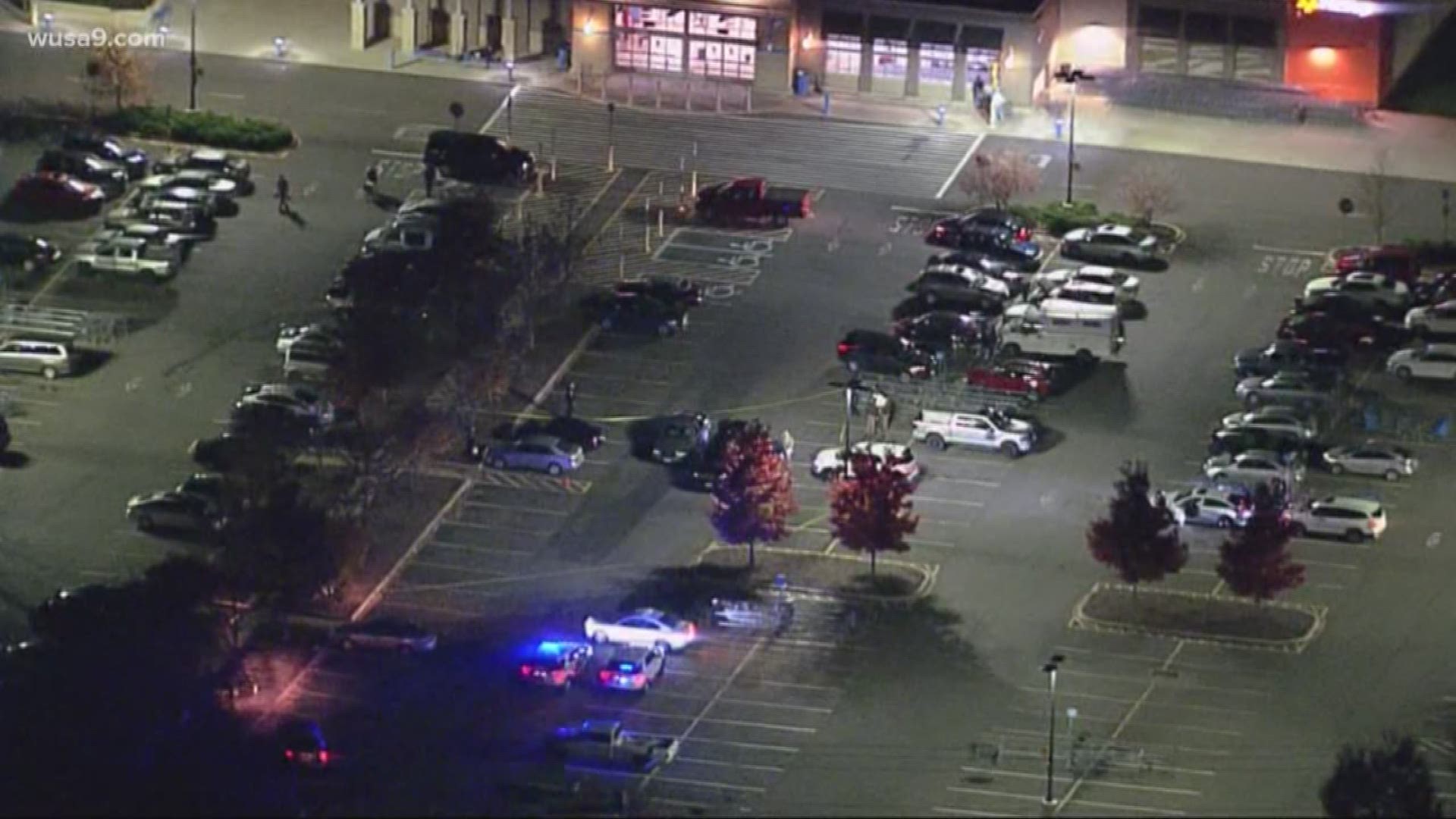A man and a woman were shot in their car after an altercation outside of Walmart on Tuesday evening. Police say all suspects are in custody.