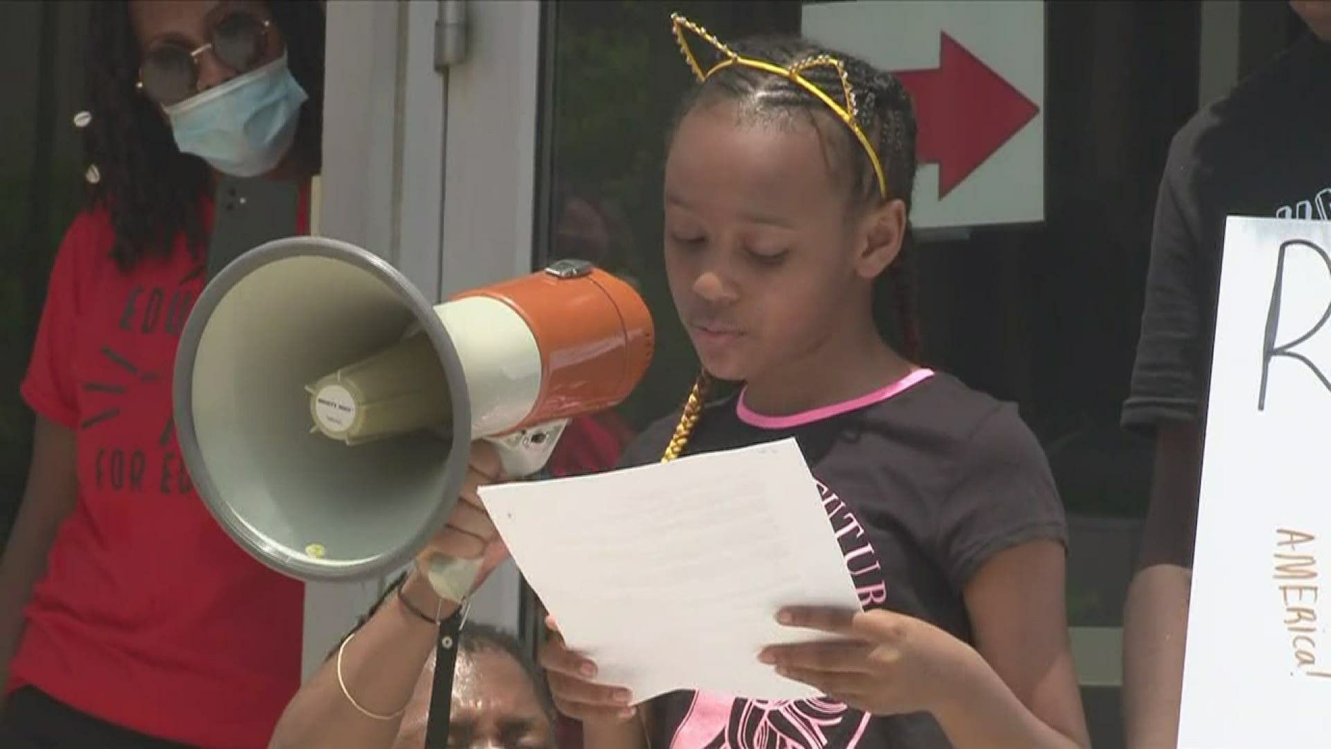 Gracie recites poems about the experience of Black students in the classroom at a Juneteenth rally in Washington, D.C.