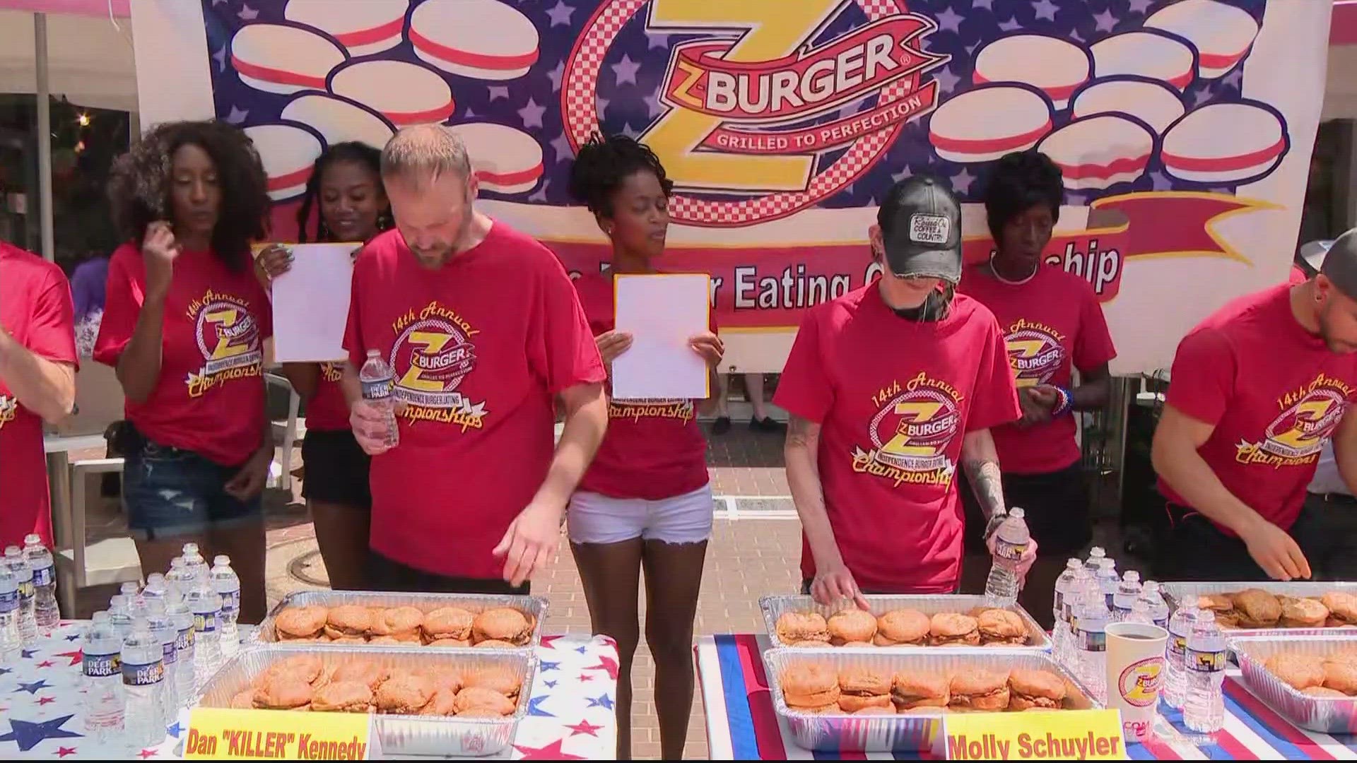 Cheered on by a large crowd, Molly Schuyler claimed her 9th trophy, devouring 34 burgers in 10 minutes to win the 14th Annual Z-Burger Championship.