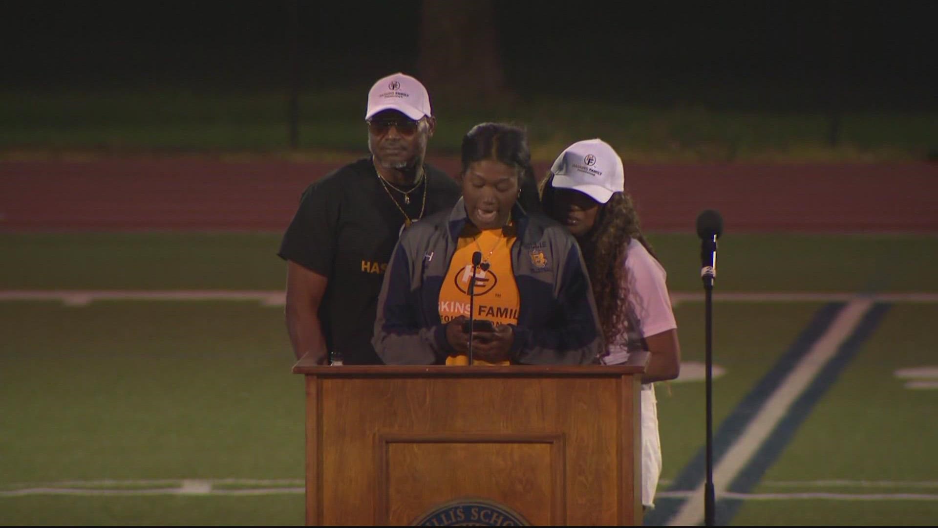 Tamia Haskins spoke at her brother's memorial in Potomac, MD. A contingent of NFL mourners led by Dan Snyder attended, with Ohio State Football Coach Ryan Day
