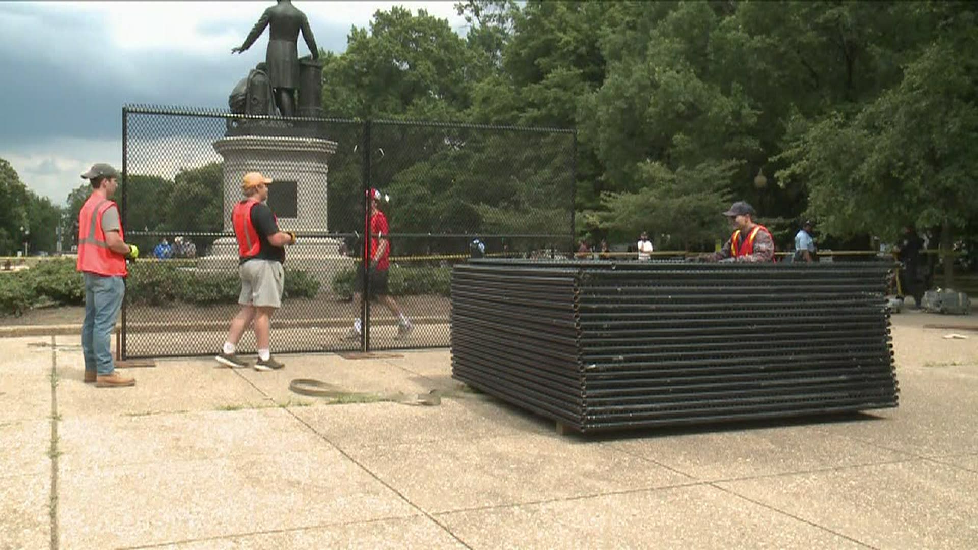 Fencing is being put up around the Emancipation Memorial in Lincoln Park in anticipation of a protest that has threatened to tear down the statue.