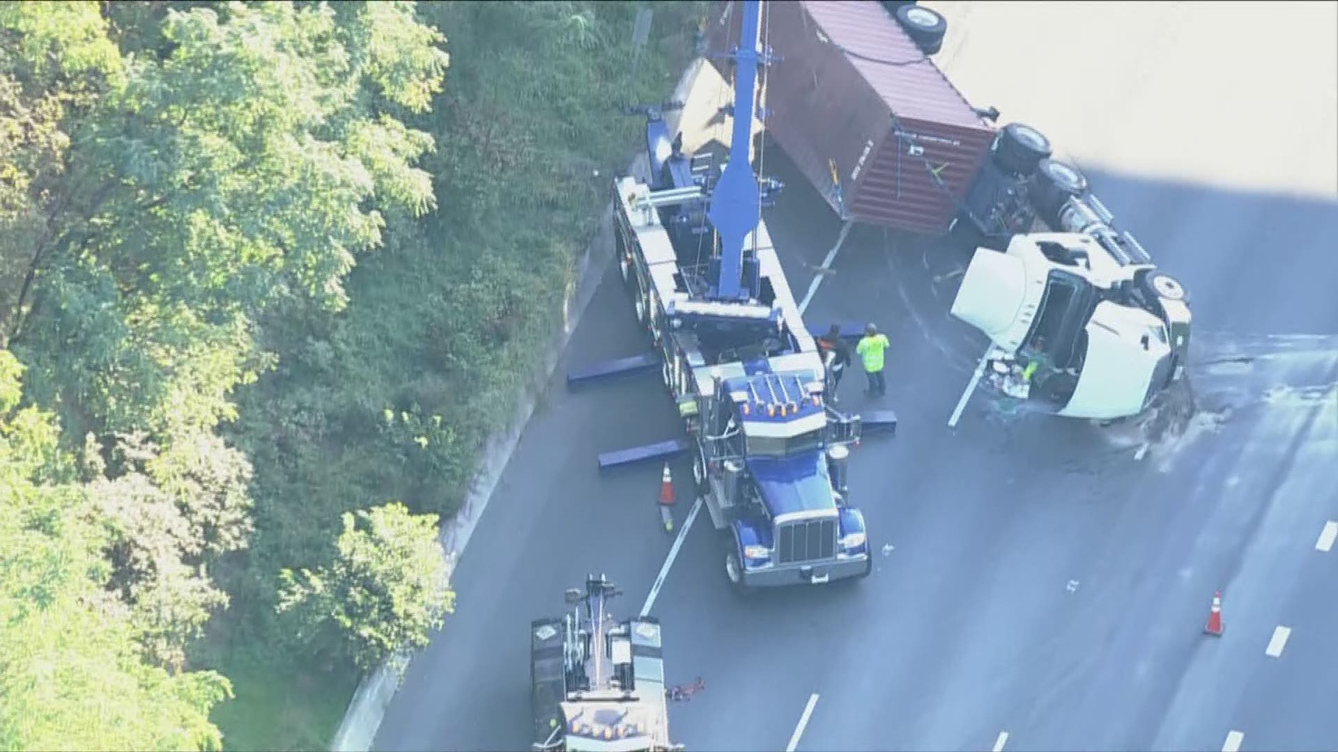 An overturned tractor-trailer on OL I-495 at Old Georgetown Road caused major delays on the roadway.