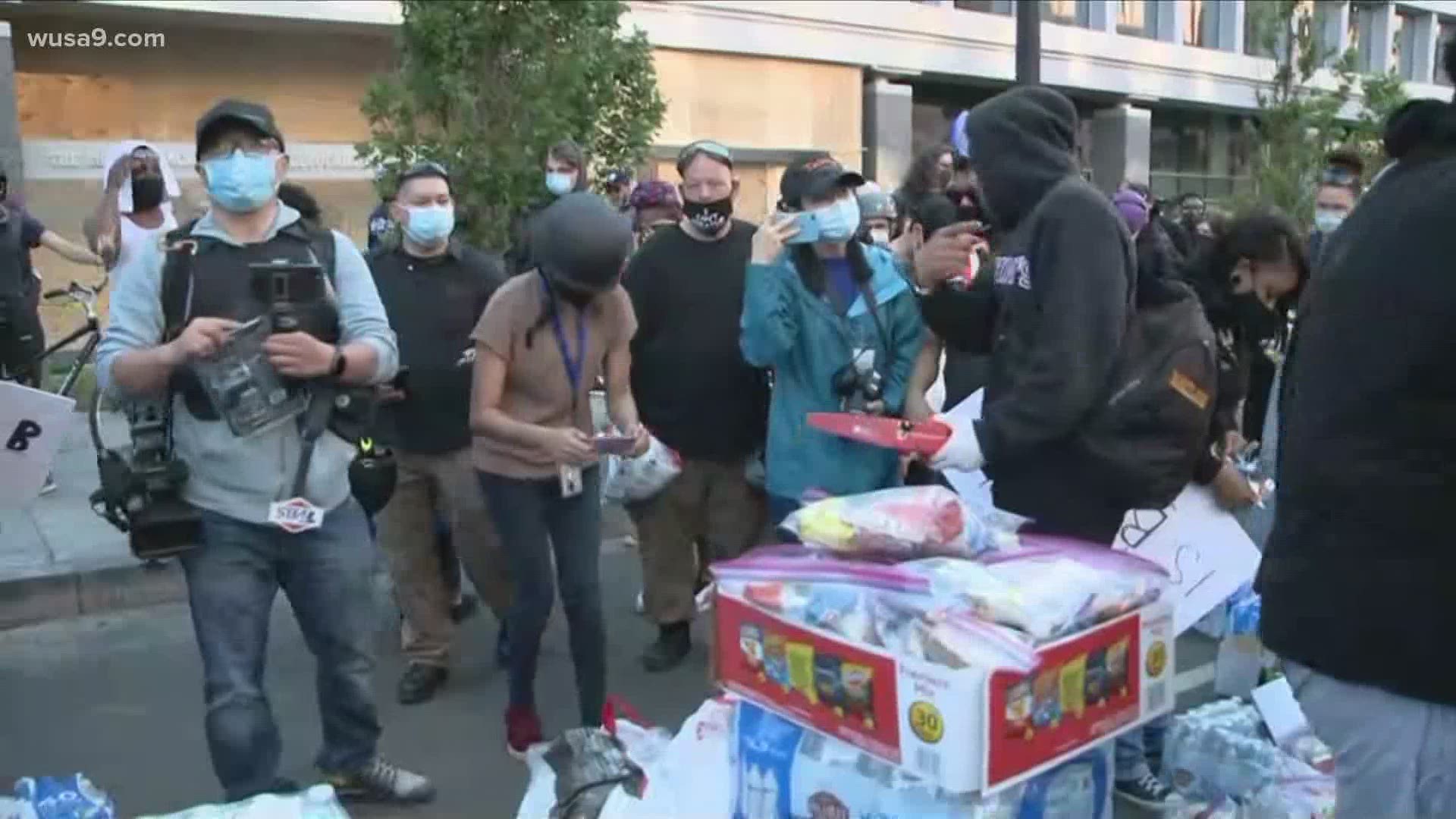 EMTs and church officials organized volunteers to hand out safety supplies during the protests, including milk to squirt on your eyes if hit with tear gas.