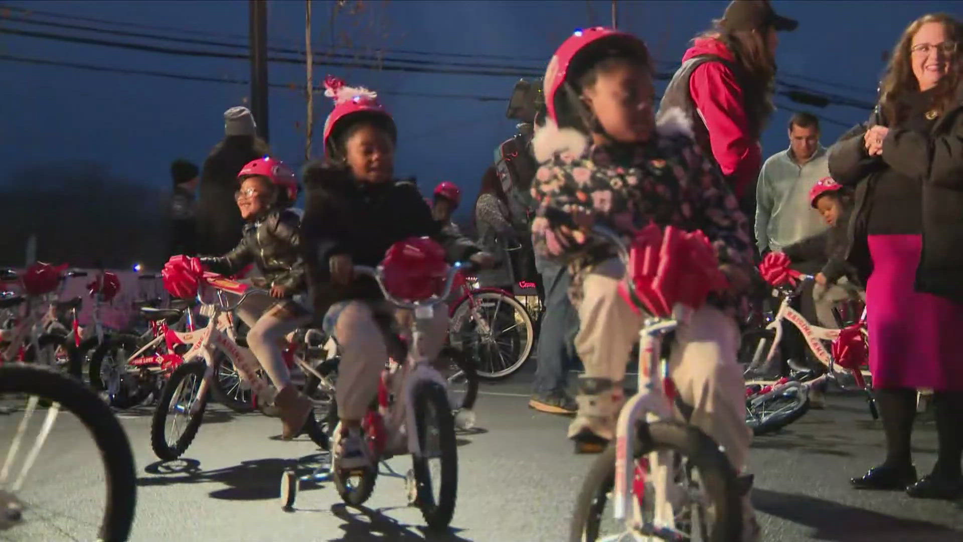 The Commanders quarterback gave 100 bikes to children with the Boys and Girls Club.