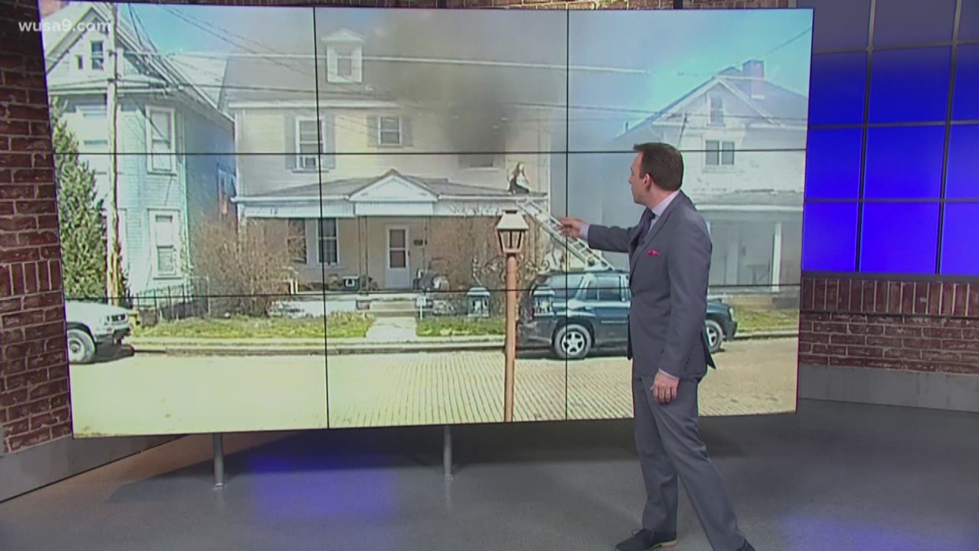 Amazing video shows good Samaritans rescue woman from roof of burning ...