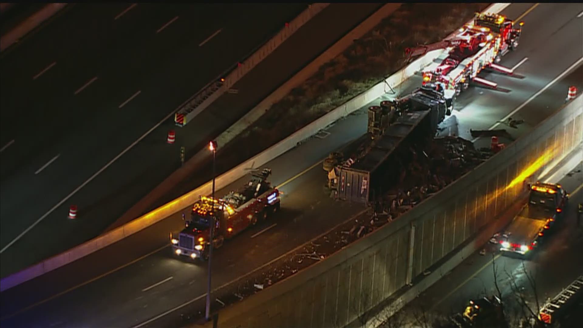 An overturned truck carrying metal debris spilled on I-66 in Northern Virginia causing traffic backups during the morning rush hour on Wednesday.