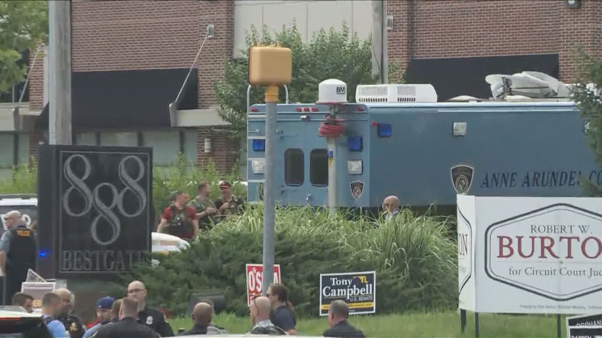 PHOTOS: Massive police response to fatal shooting at Capital Gazette ...