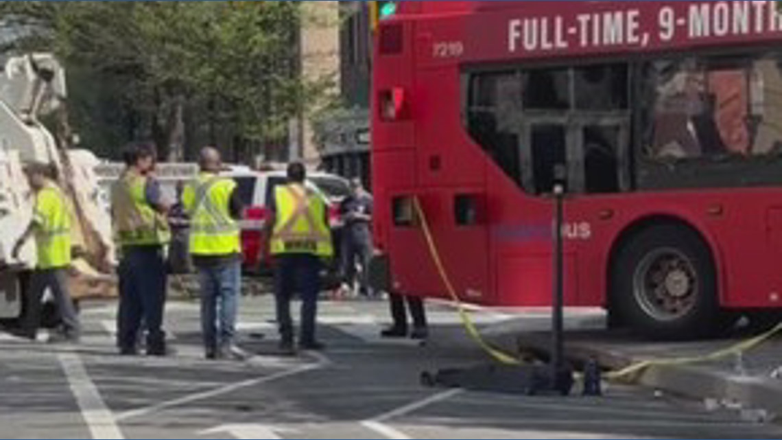 Crews work to remove bus from DC restaurant after crash | wusa9.com