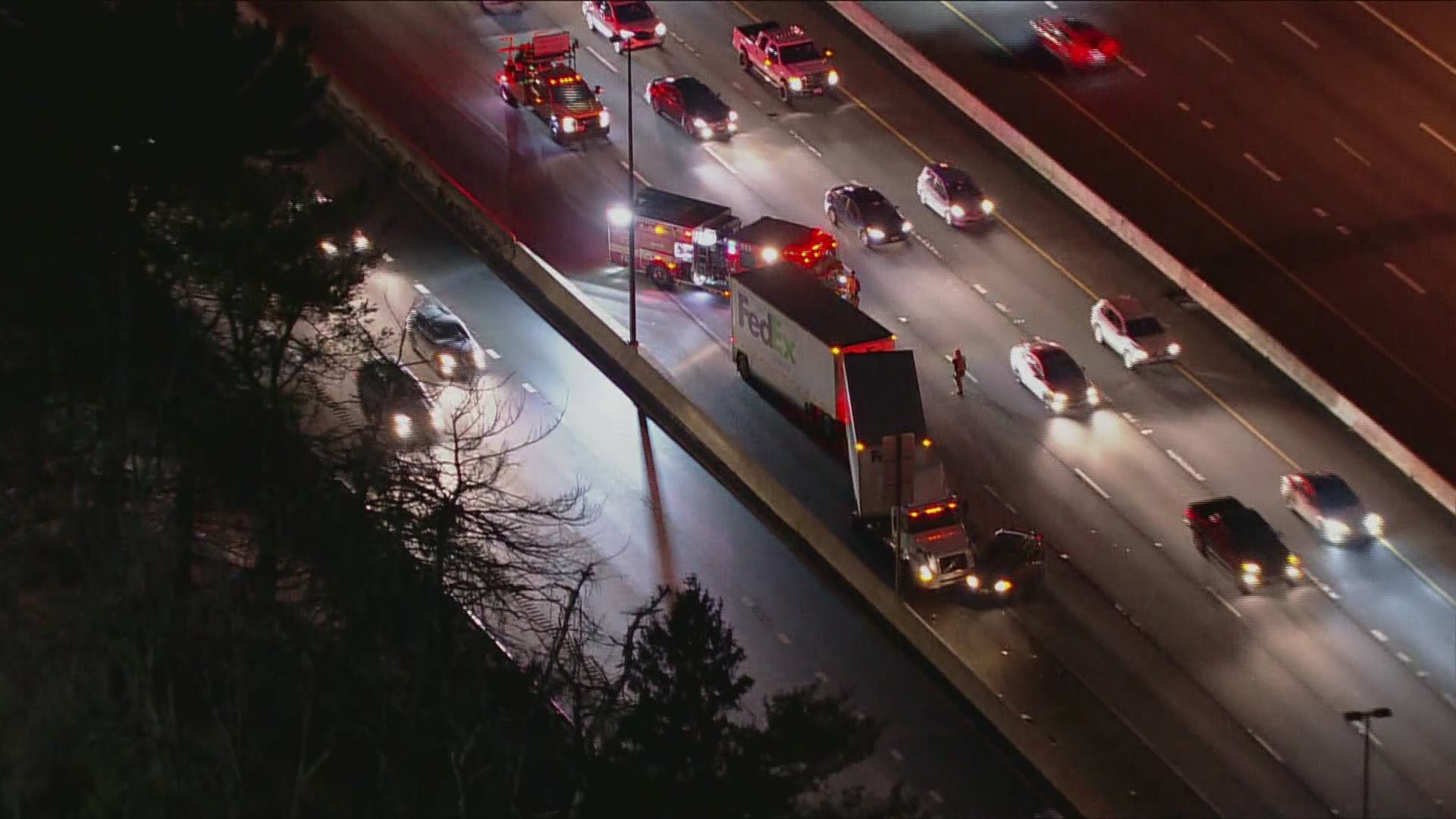 A multi-vehicle crash involving a FedEx truck blocked two lanes on SB I-270 causing major delays.