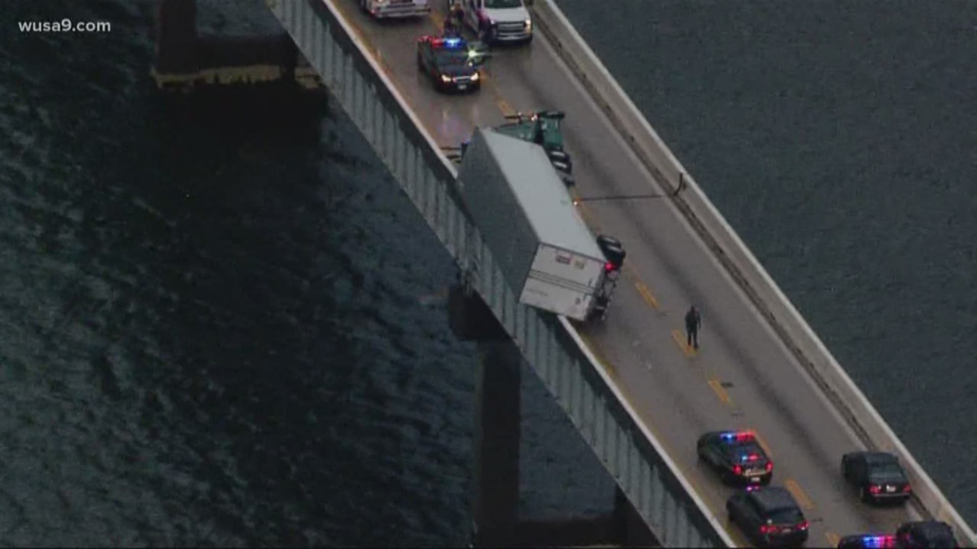 Semi Truck Dangles Over Edge Of Bay Bridge