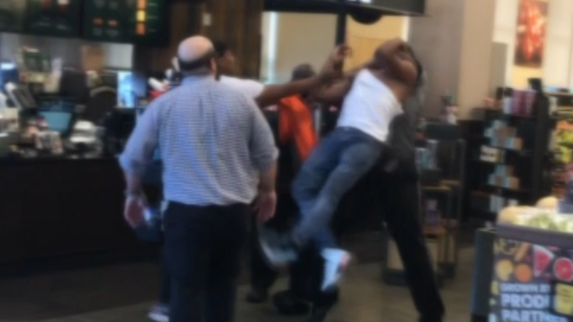 Image result for Security guard slams man accused of stealing from DC Safeway store