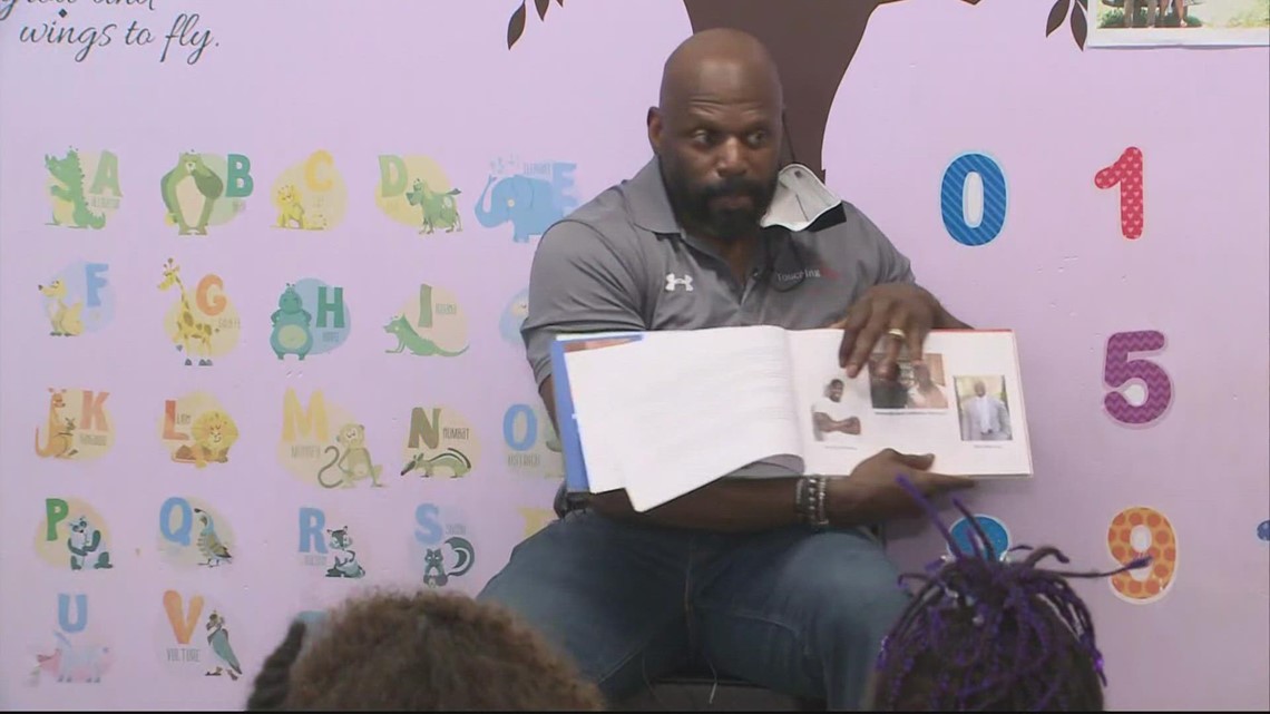 Washington NFL legend Ken Harvey reads his children's books to kids in Alexandria, VA