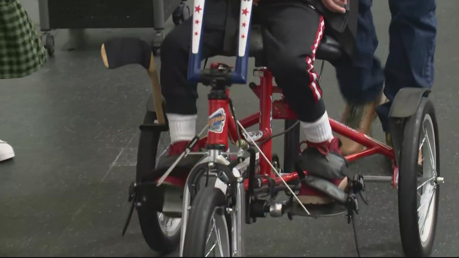 8-year-old Lamar Collado now has a fun new way to get around - a Capitals themed adaptive bike.