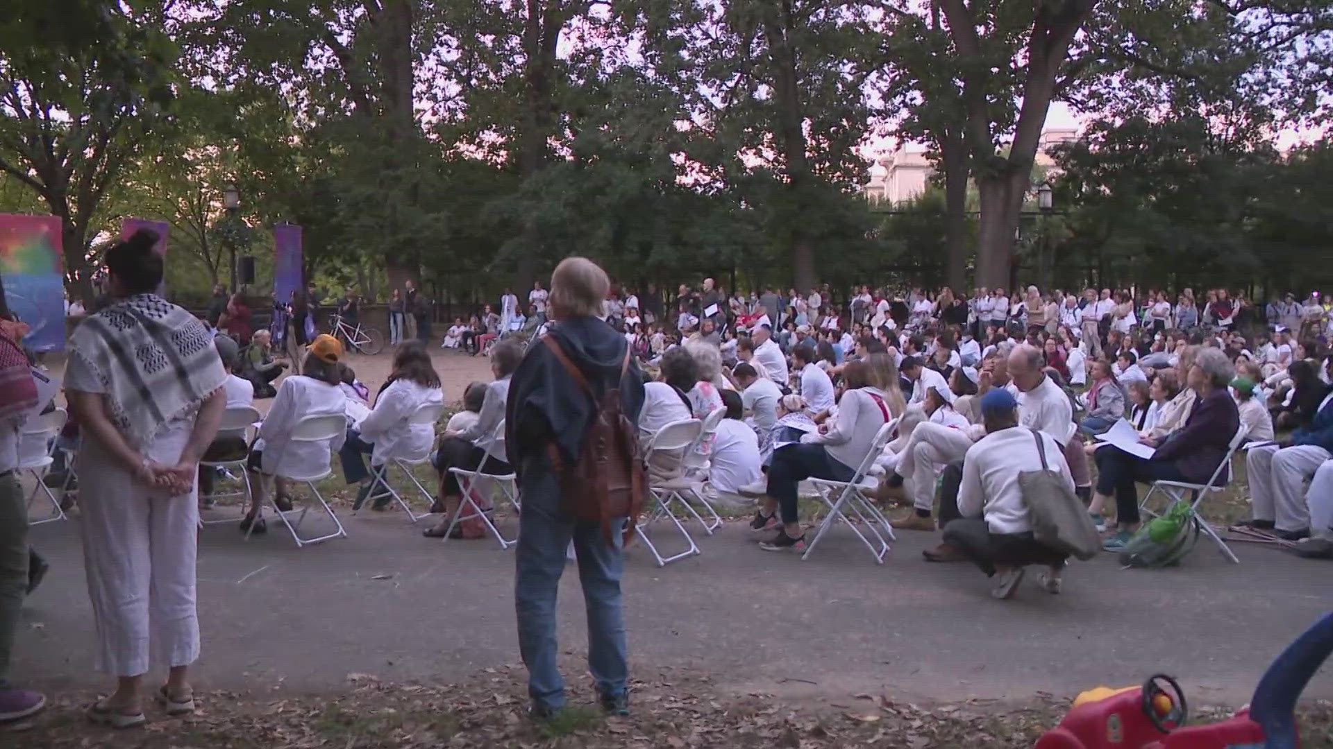 Those who attended were asked to not bring signs or flags, but to instead bring flowers and wear white.