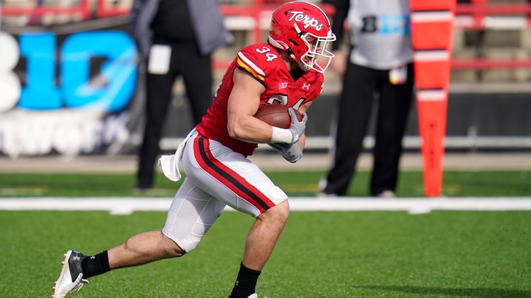 Former Maryland running back Jake Funk waits to hear his name called in NFL Draft