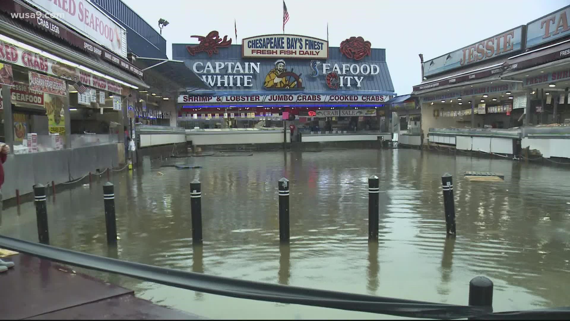 Despite the high waters, some customers were out to get their seafood, rain or shine.
