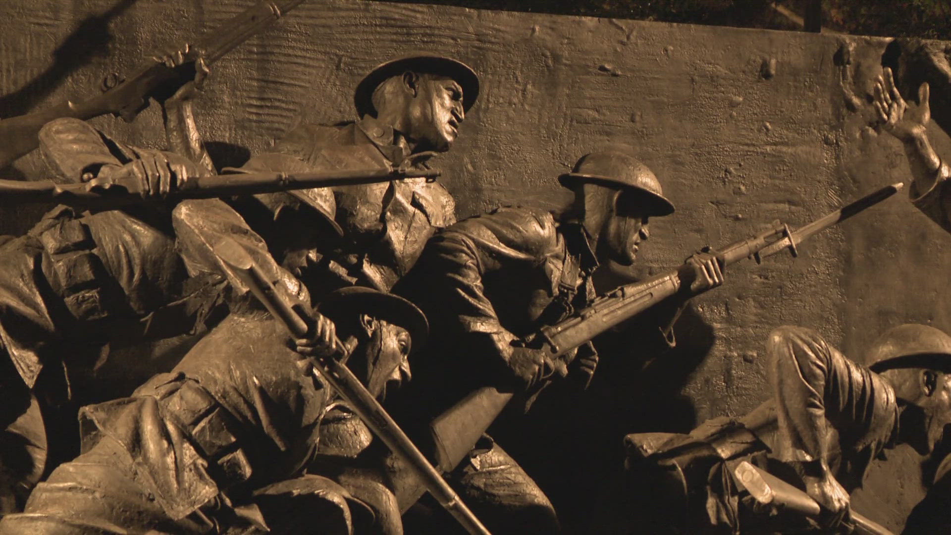 Light pierced a dark moment in U.S. history as the completed WWI memorial was unveiled.