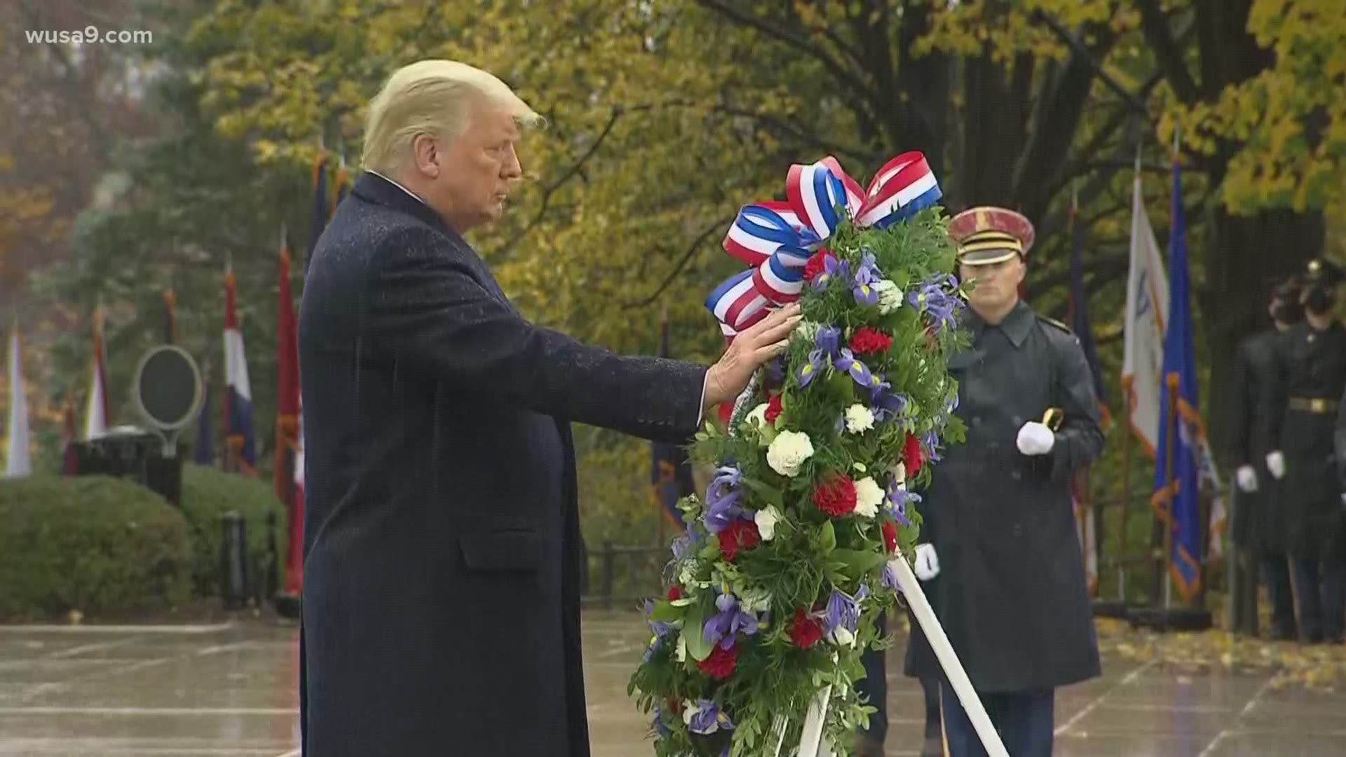 President Donald Trump attends wreath-laying ceremony at Arlington National Cemetery to honor veterans.