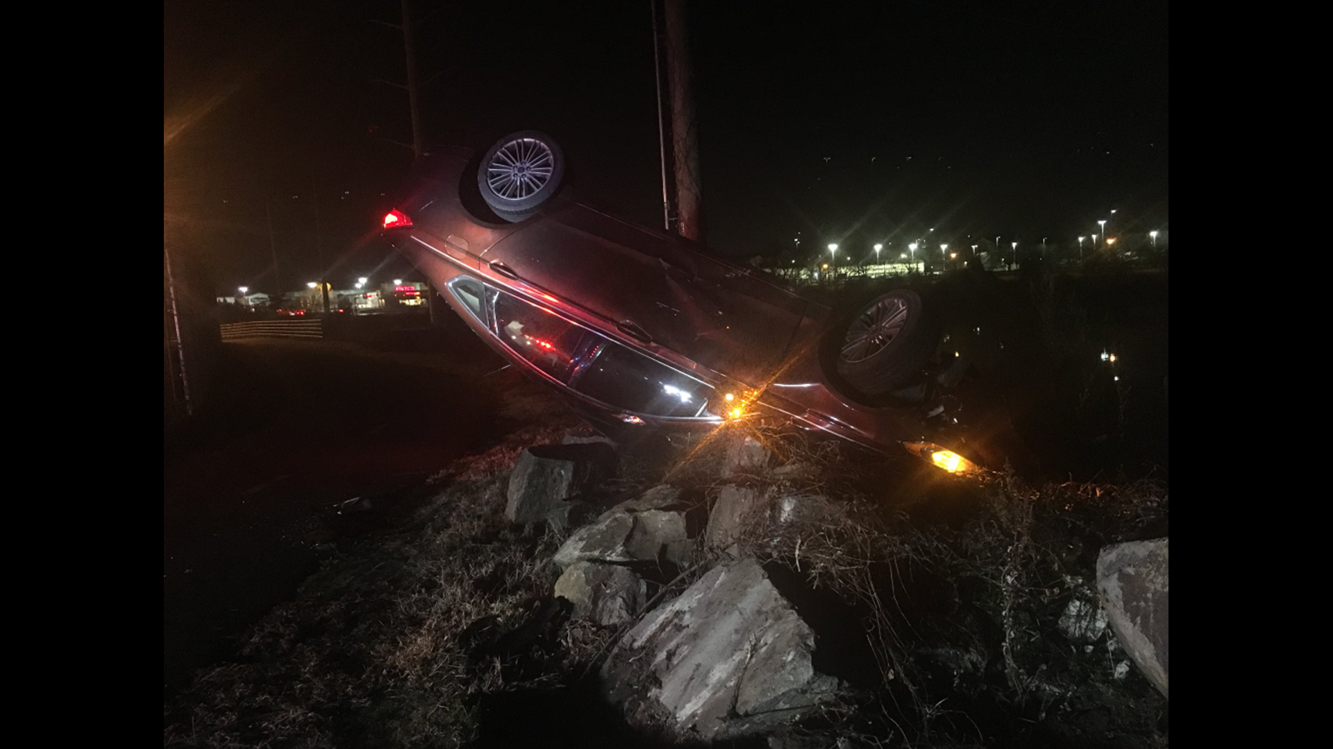 Police pursuit leads suspect to crash car in creek in Arlington | wusa9.com