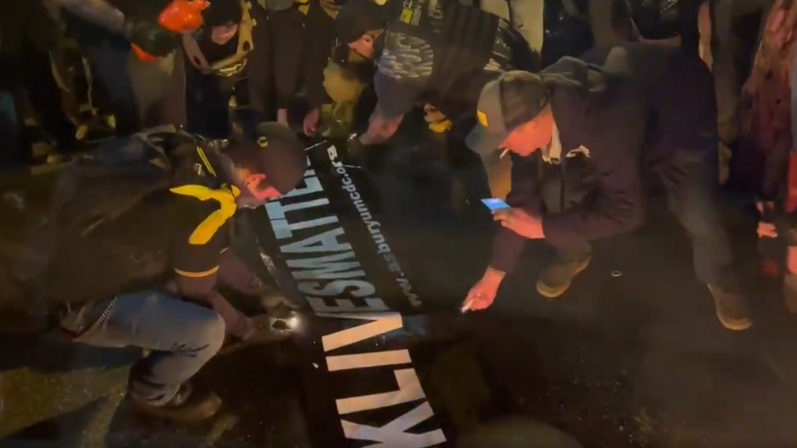 Group burns Black Lives Matter banner taken from DC's oldest Black church during MAGA protest
