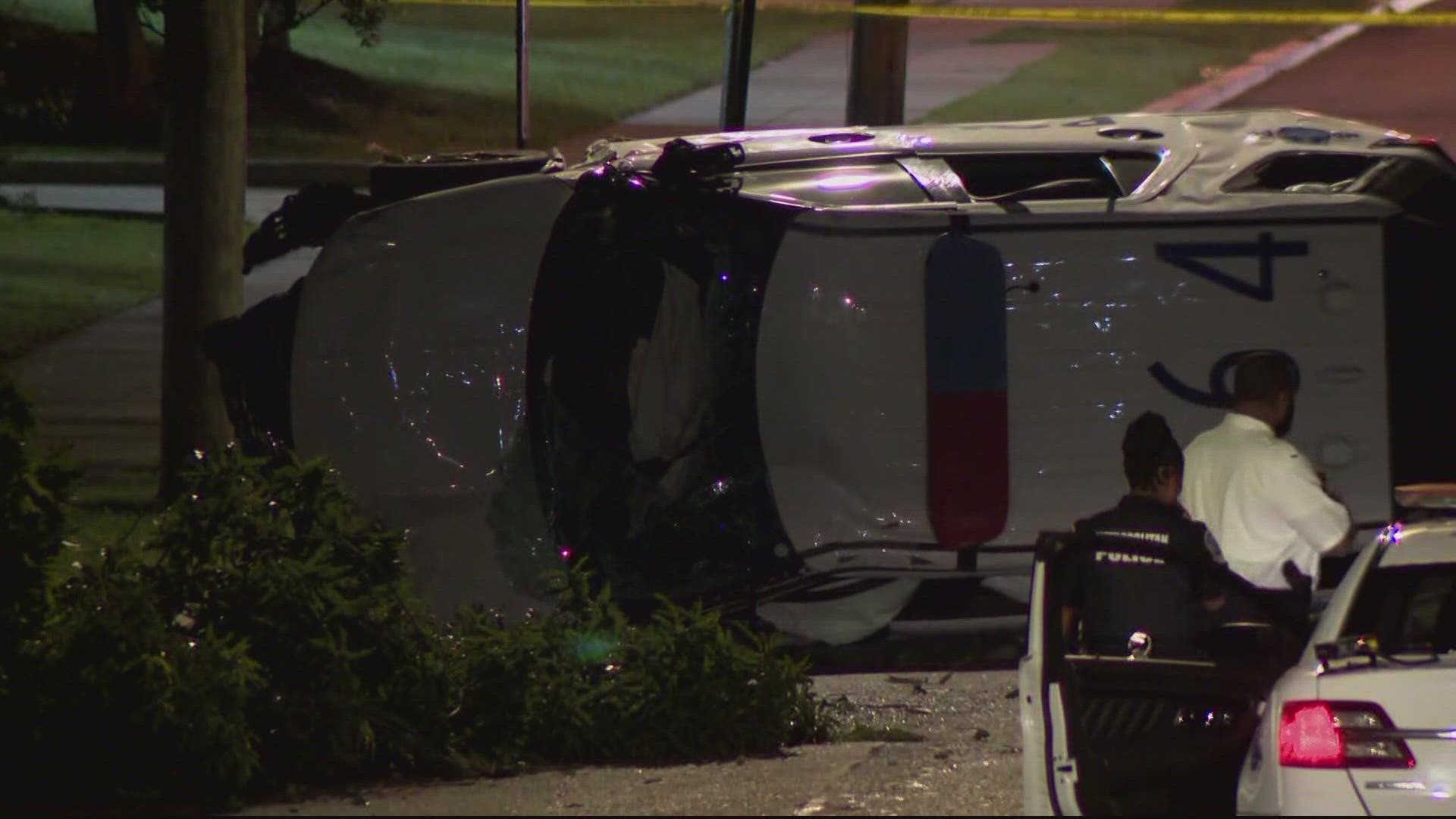 Four officers were sent to the hospital after the police SUV they were in crashed and flipped on the way to a scene.