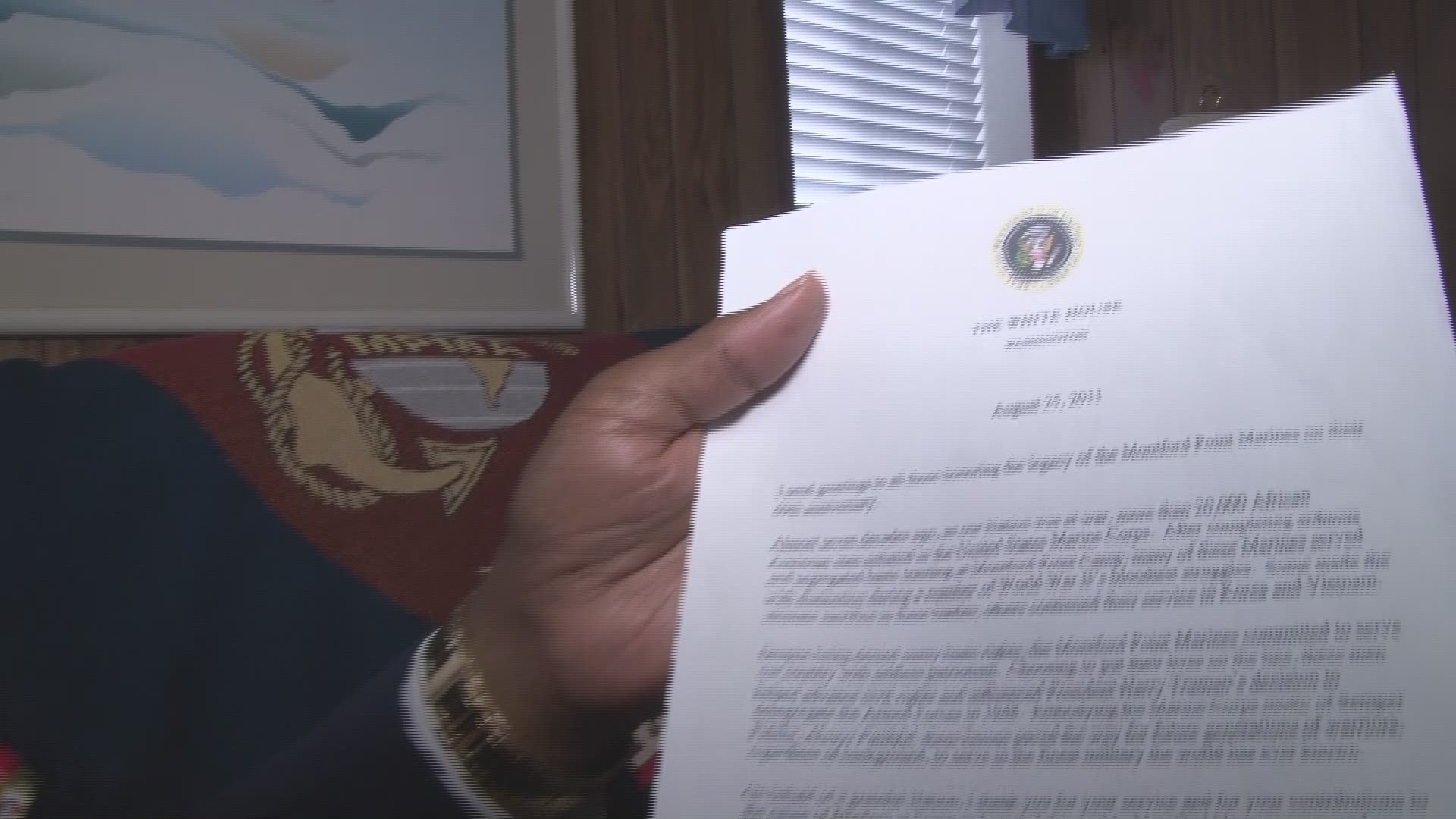 Staff Sgt. Groves and Staff Sgt. Griffin received their congressional gold medal, an award that thousands of Montford Point Marines don't have but are eligible for. SSgt. Groves reads a letter from Pres. Obama.
