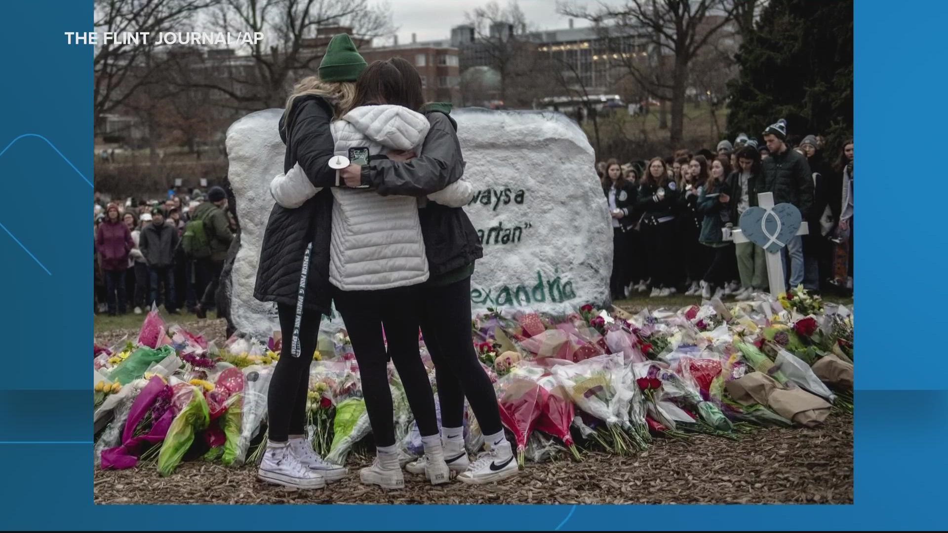 The man who shot eight students at Michigan State University, killing three, was found with two handguns and a note containing a possible motive for the attack.