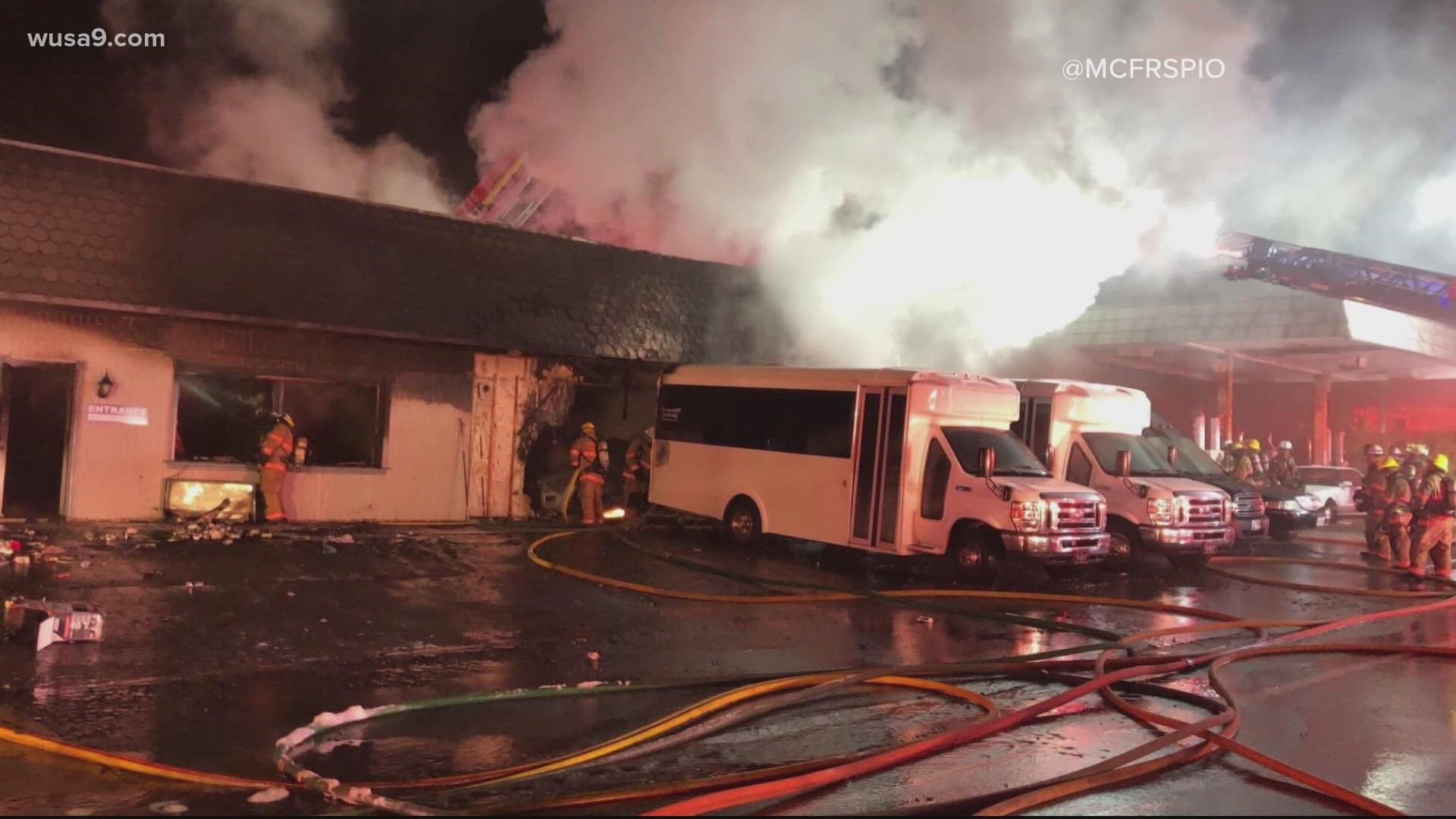 Several Damascus, Maryland, businesses went up in flames Sunday night after a vehicle crashed into a commercial limo company and caught fire, firefighters say.