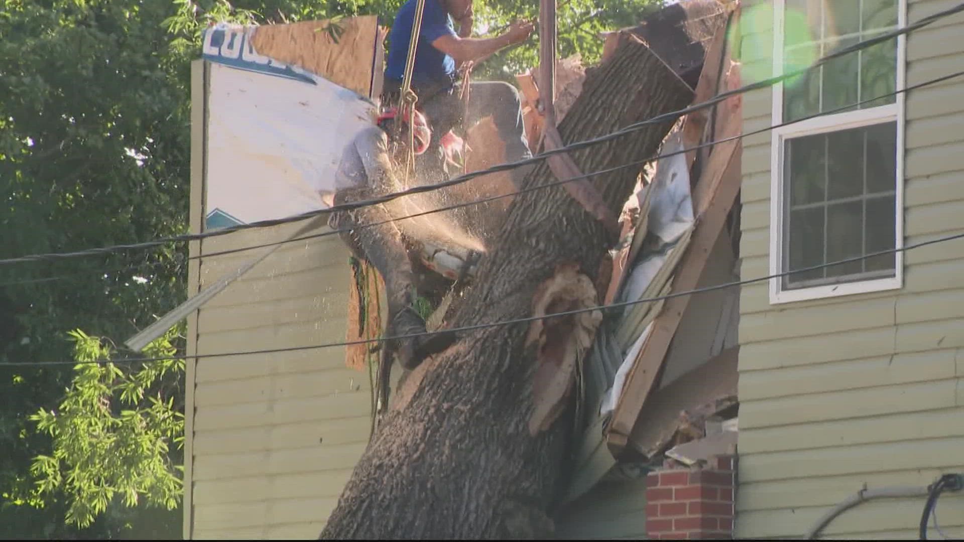 Tuesday's severe weather knocked down trees and power lines. Many residents are still in the dark Thursday.