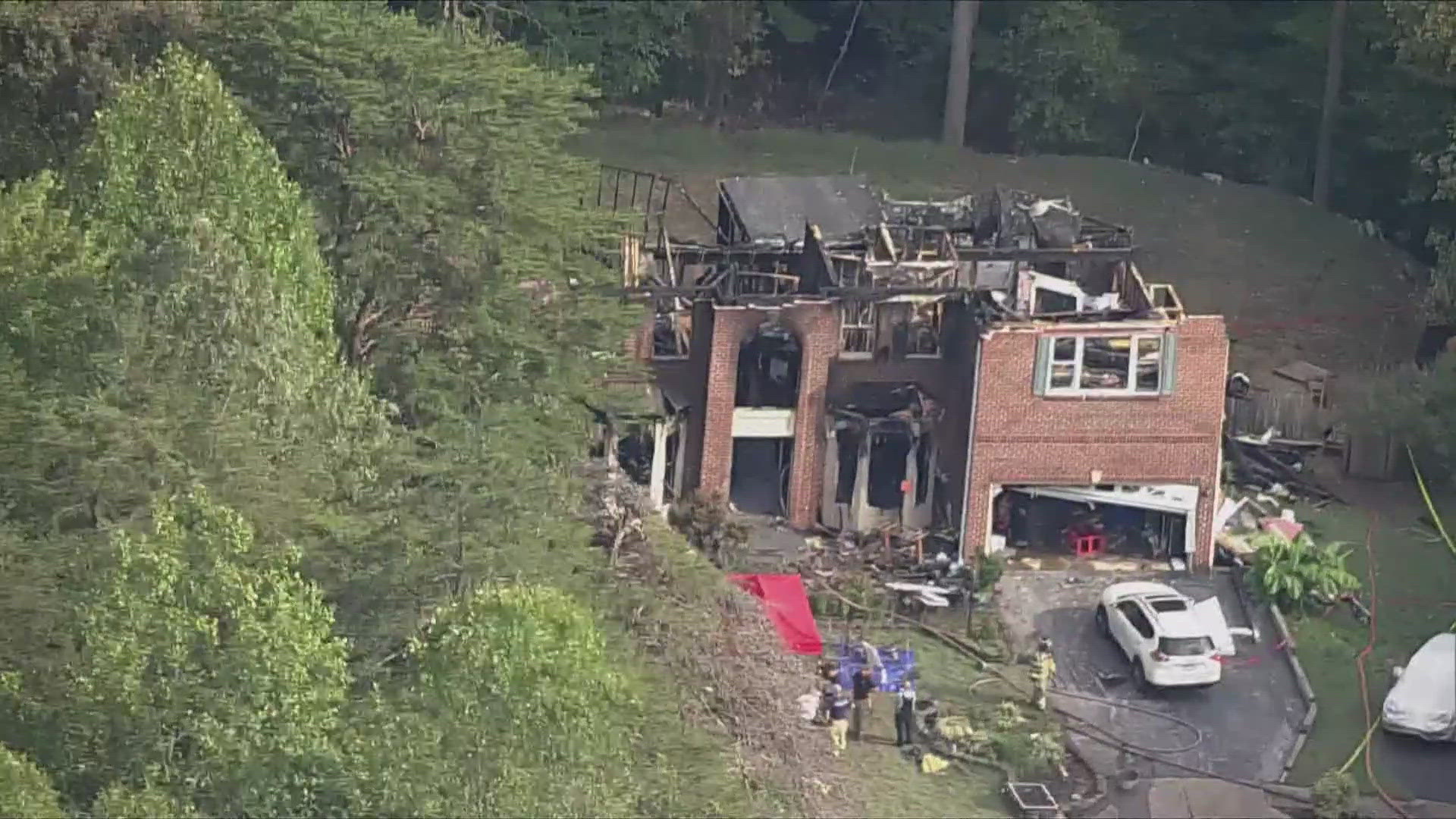 Authorities are investigating what fostered the fire. A mother and her two sons were found dead inside the house.