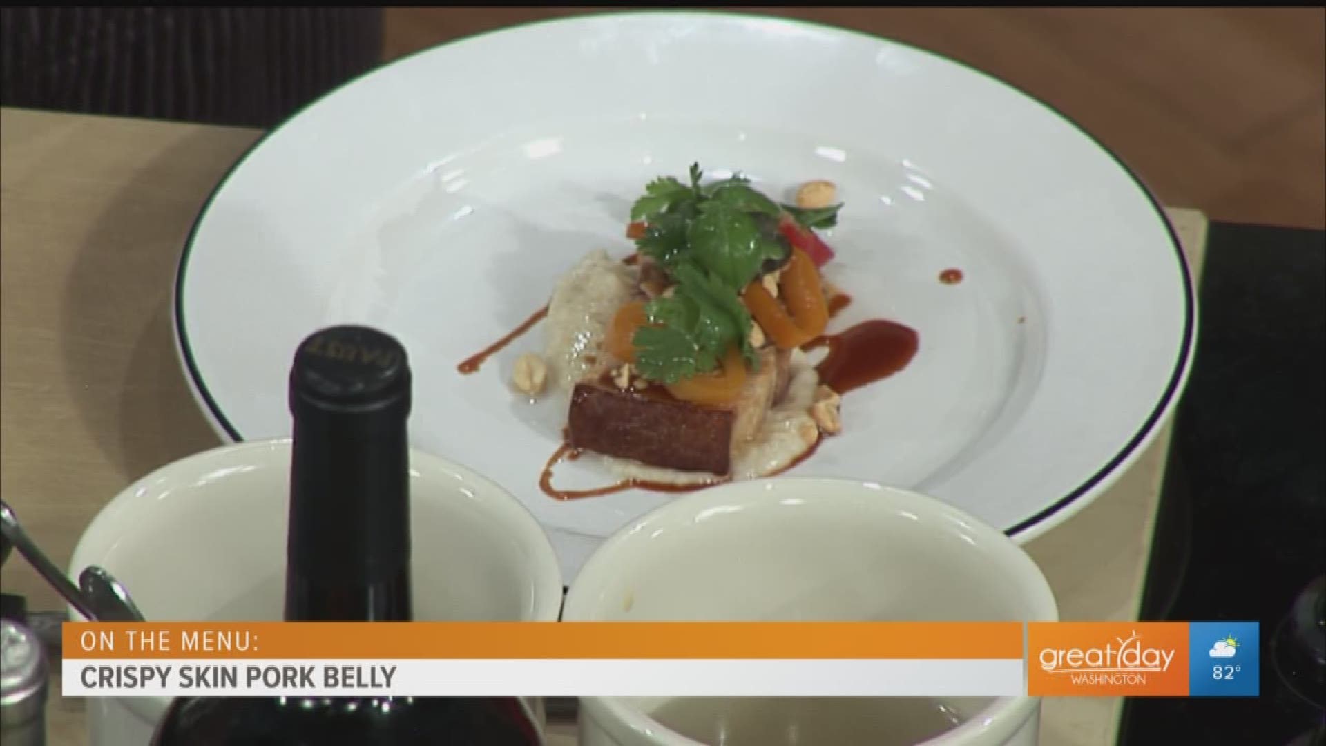 Chef Joseph Conrad of Oak Steakhouse in Alexandria makes crispy skin pork belly paired with Anson Mills white grits. Oak Steakhouse recently opened in Alexandria, VA.