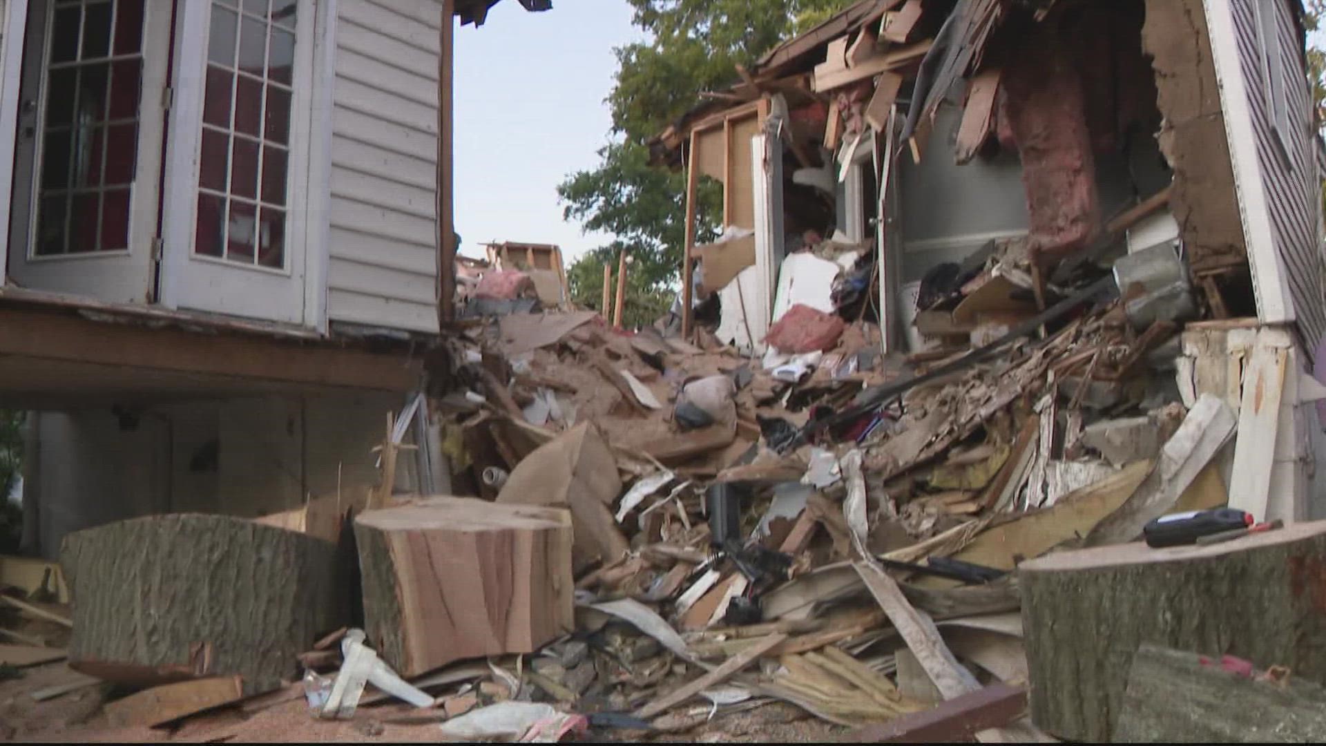 A tree collapsed on their home, trapping them inside until they were able to get out through a window.