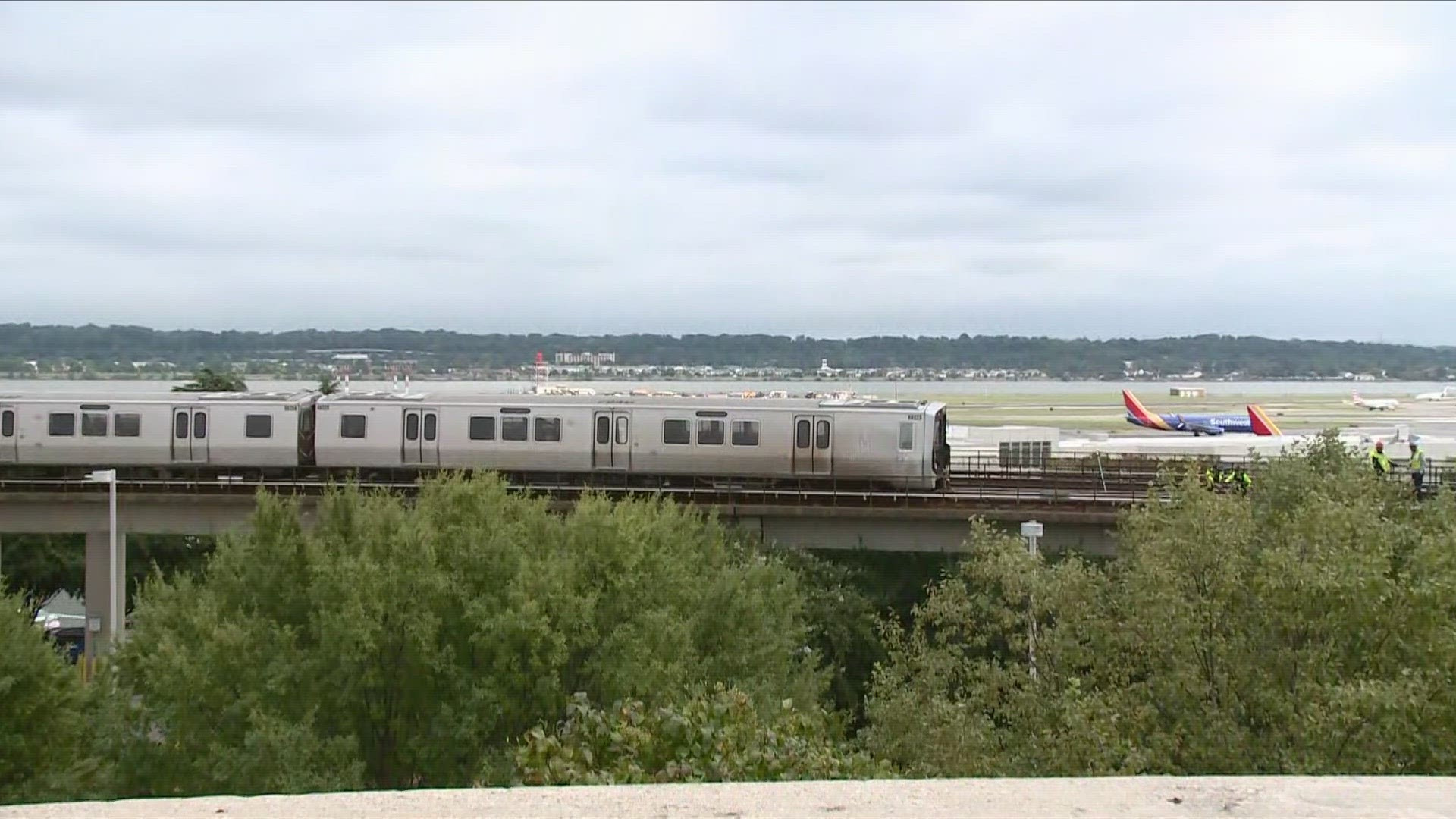 A Blue Line train derailed outside Reagan National Airport Friday morning, causing delays.