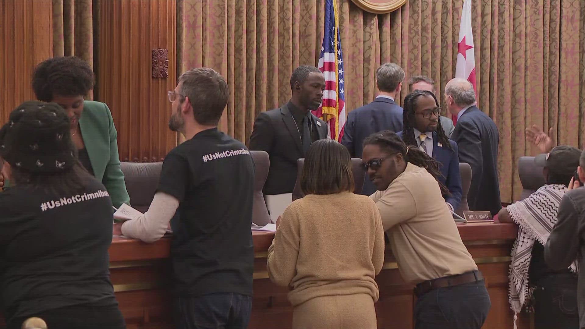 More than 100 community activists descended upon the DC Council on Tuesday for debate and the first of two votes on the massive crime omnibus bill.