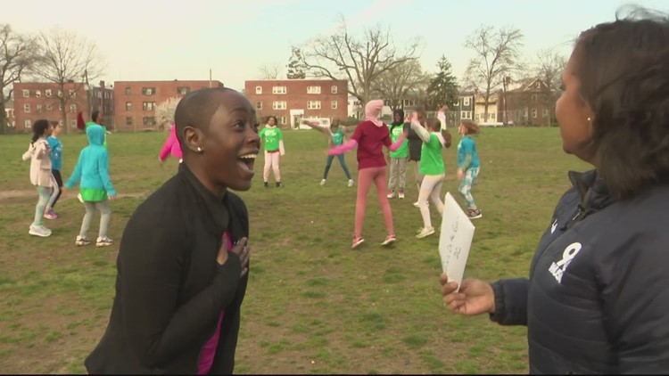 We surprised Girls on the Run DC with a check for $2,200 | Get Up Give Back