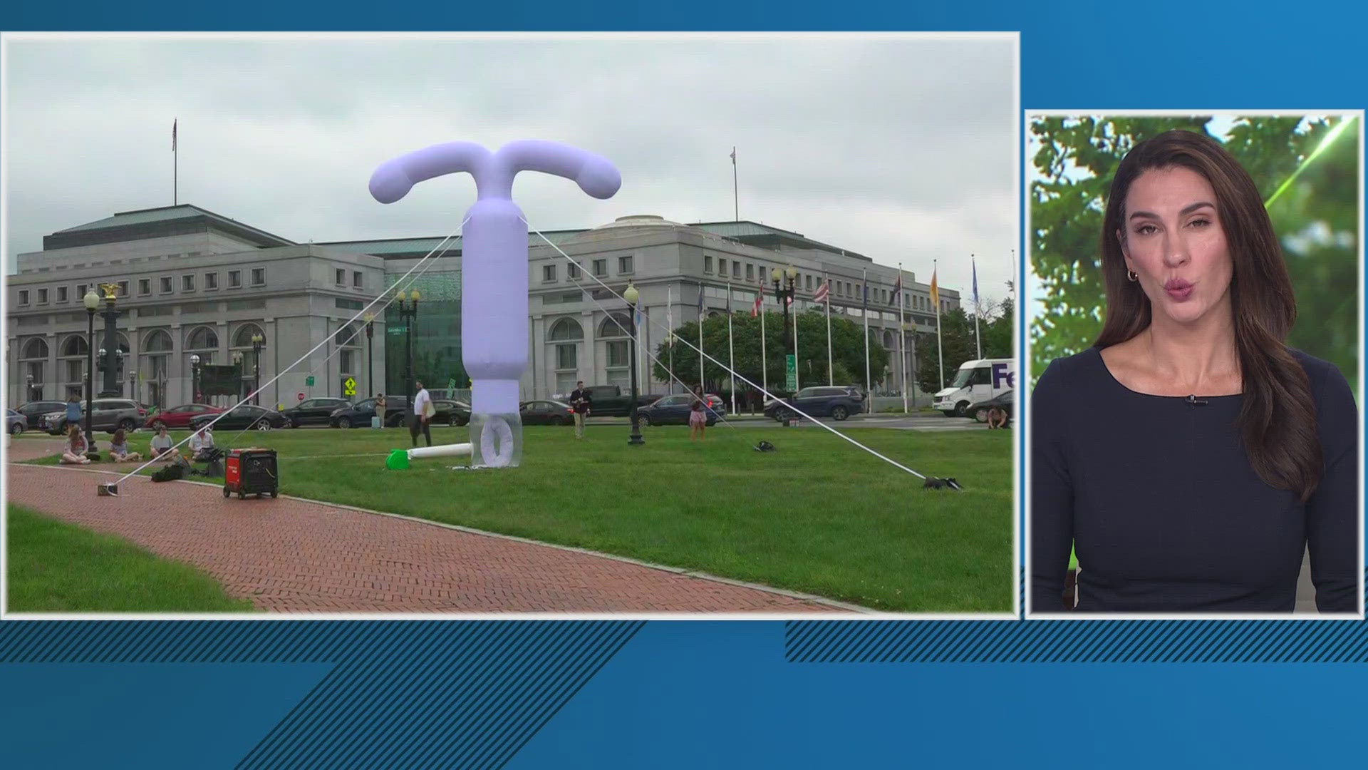 RIGHT NOW A GIANT INFLATABLE STATUE OF AN I-U-D IS BEING TAKEN DOWN. THE 20-FOOT DISPLAY SPENT THE PAST 8 HOURS OUTSIDE OF UNION STATION.