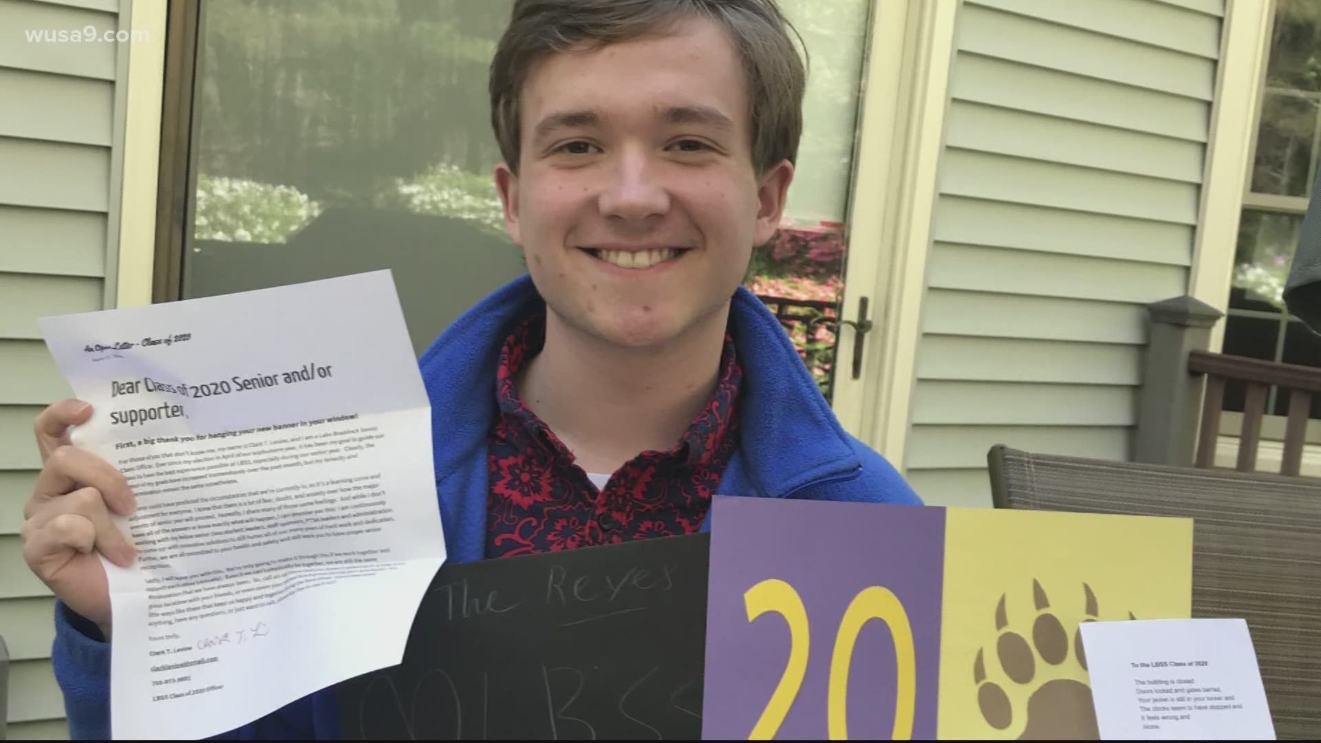 Lake Braddock Secondary School student delivers banners to graduates