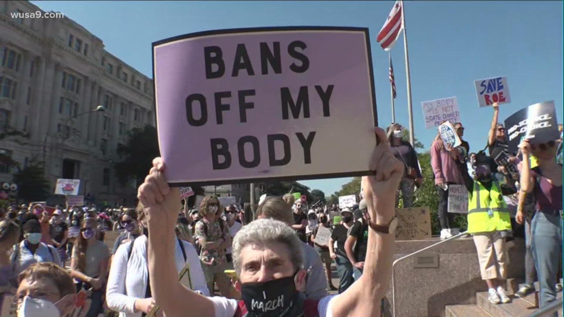 People marched to the Supreme Court Saturday in support of abortion rights as part of the Women's March Rally for Abortion Justice.