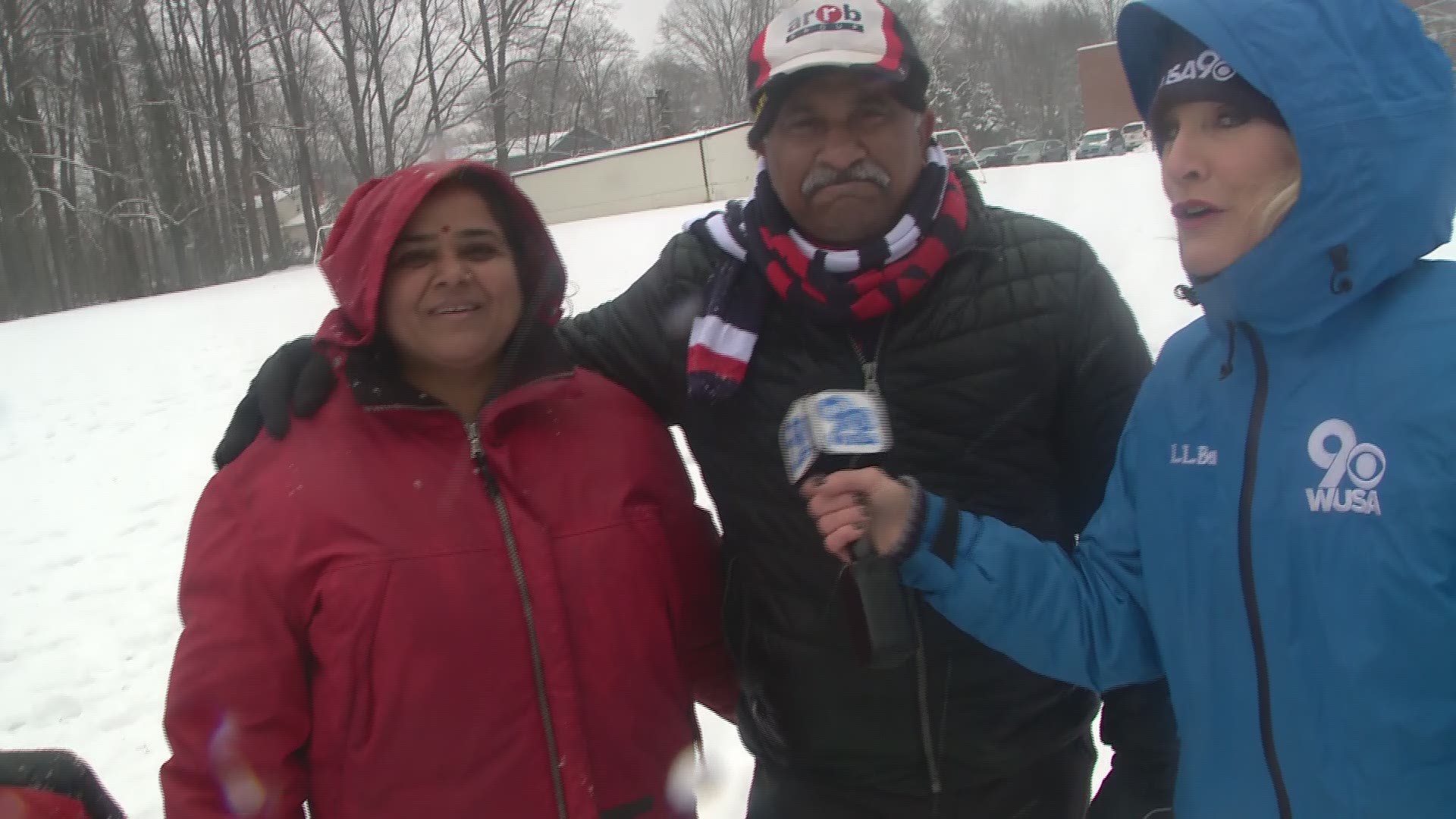 Couple from New Delhi, India sees snow for the first time while celebrating their anniversary in Virginia.
