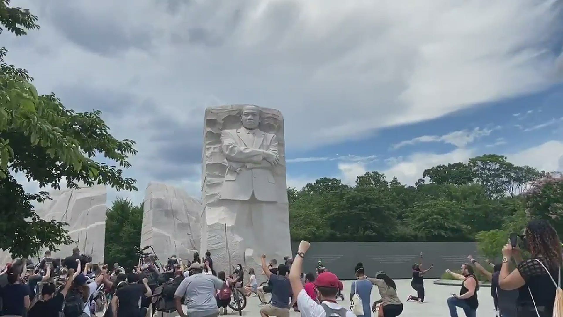 2:19 p.m. -- In front of the Martin Luther King Jr. Memorial, dozens take an 8 minute and 46 second moment of silence in remembrance of George Floyd.